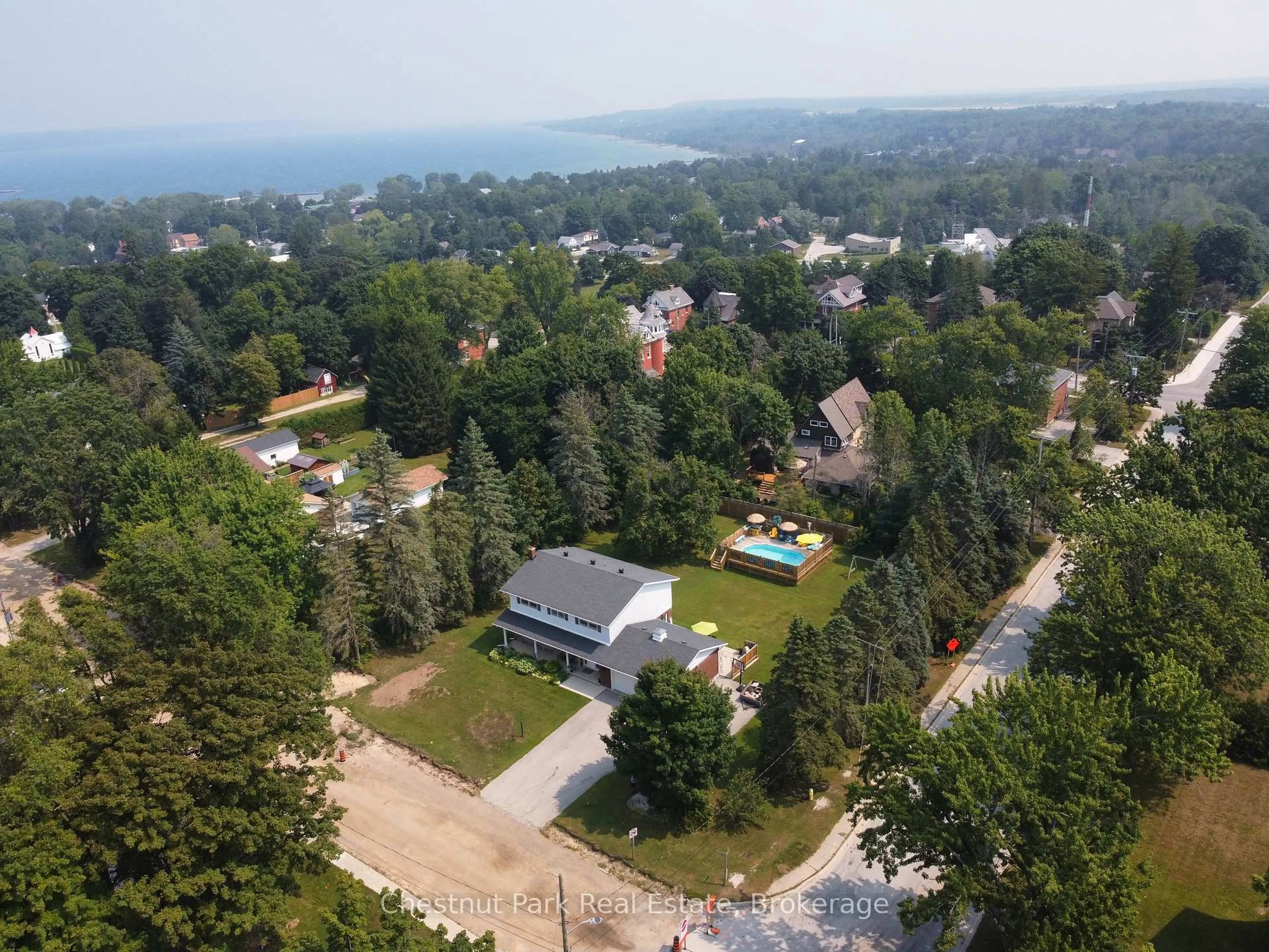 A pic from outside/outdoor area/front of a property/back of a property/a pic from drone, unknown for 319 Gould St, South Bruce Peninsula Ontario N0H 2T0