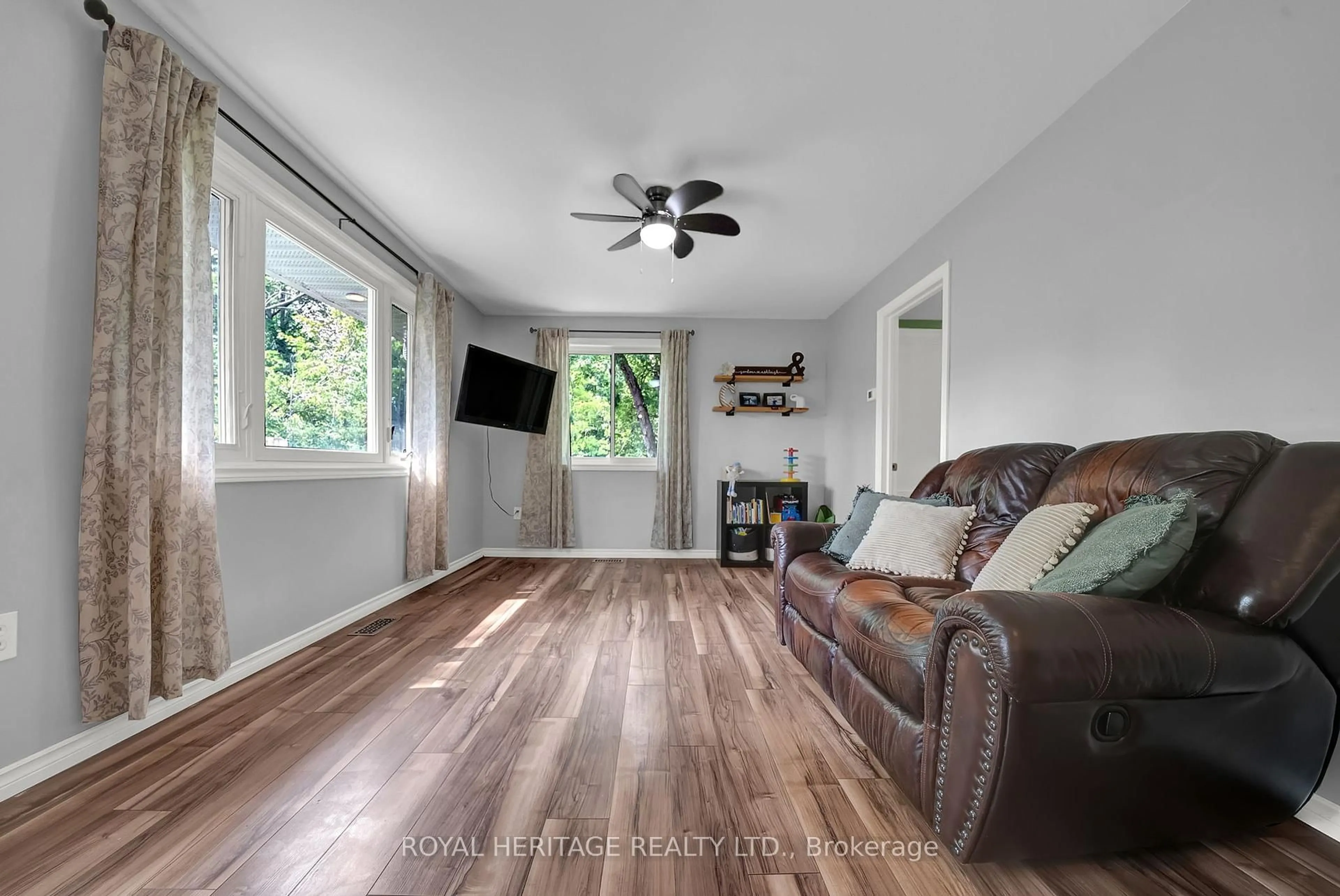Living room with furniture, wood/laminate floor for 5565 5th Line, Port Hope Ontario L1A 3V8