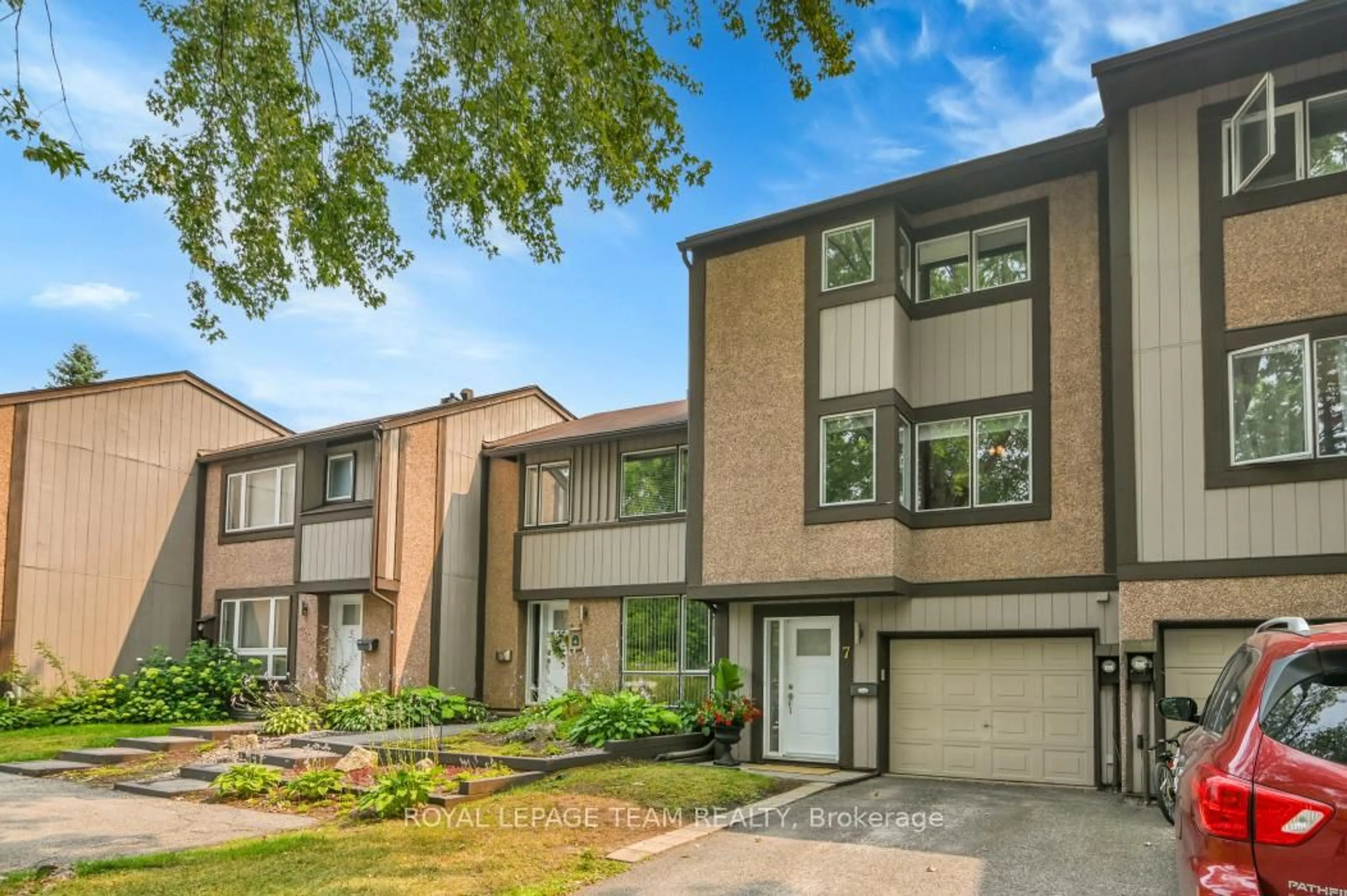 Home with brick exterior material, street for 7 Reaney Crt, Kanata Ontario K2K 1W7