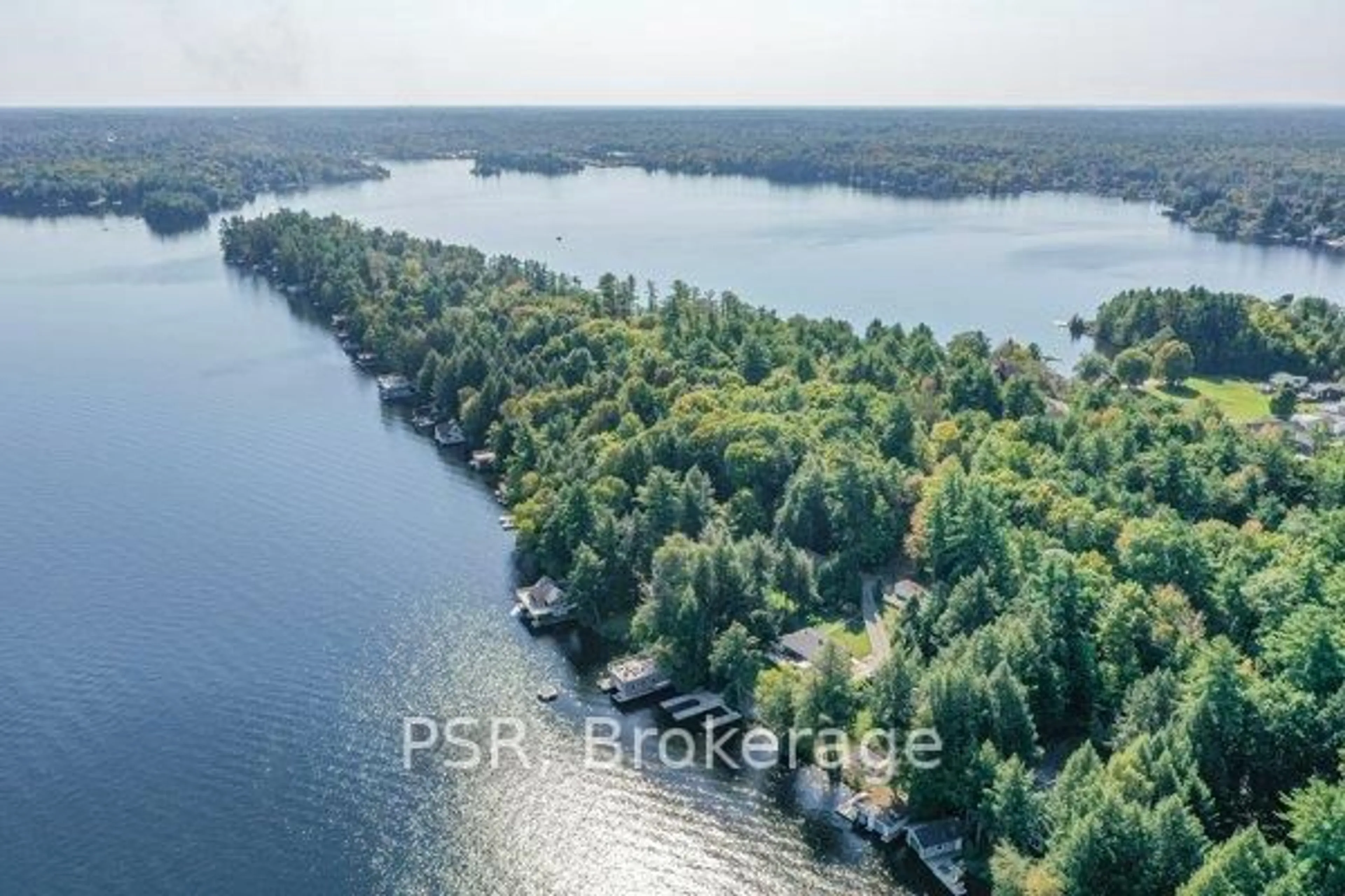 A pic from outside/outdoor area/front of a property/back of a property/a pic from drone, water/lake/river/ocean view for 1018 Georgina Way #1, Gravenhurst Ontario P1P 1R2