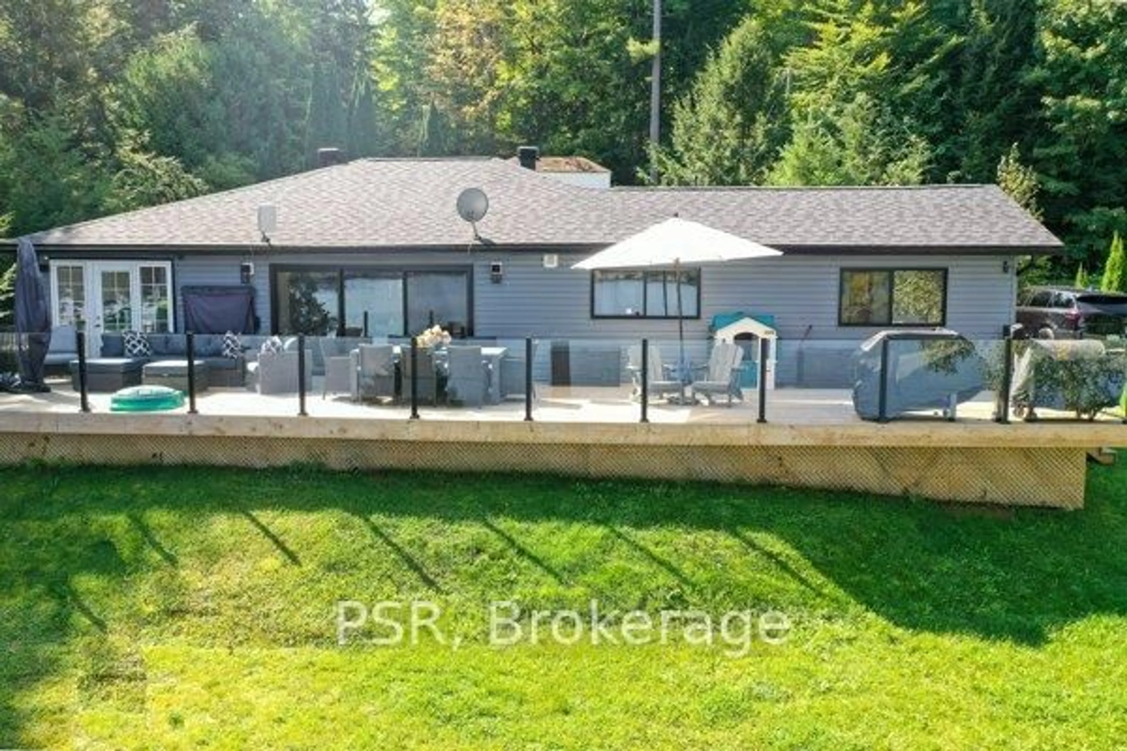A pic from outside/outdoor area/front of a property/back of a property/a pic from drone, water/lake/river/ocean view for 1018 Georgina Way #1, Gravenhurst Ontario P1P 1R2