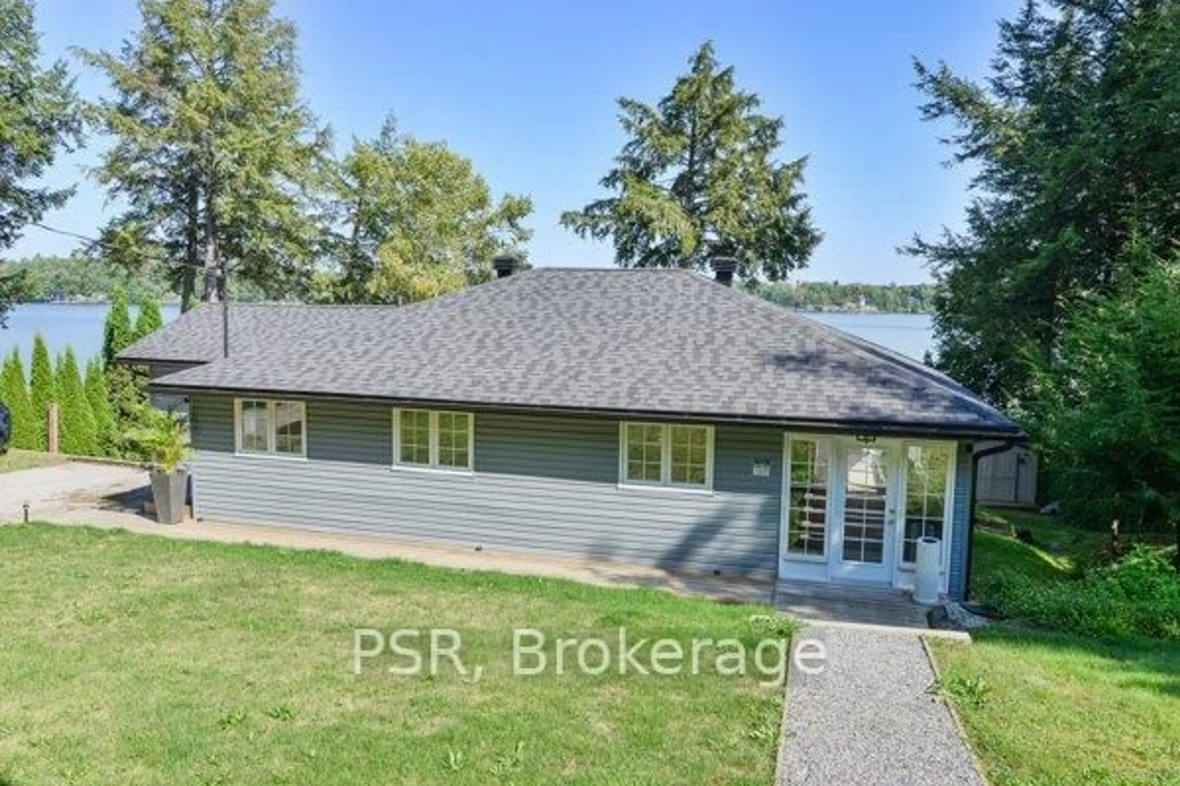 A pic from outside/outdoor area/front of a property/back of a property/a pic from drone, water/lake/river/ocean view for 1018 Georgina Way #1, Gravenhurst Ontario P1P 1R2