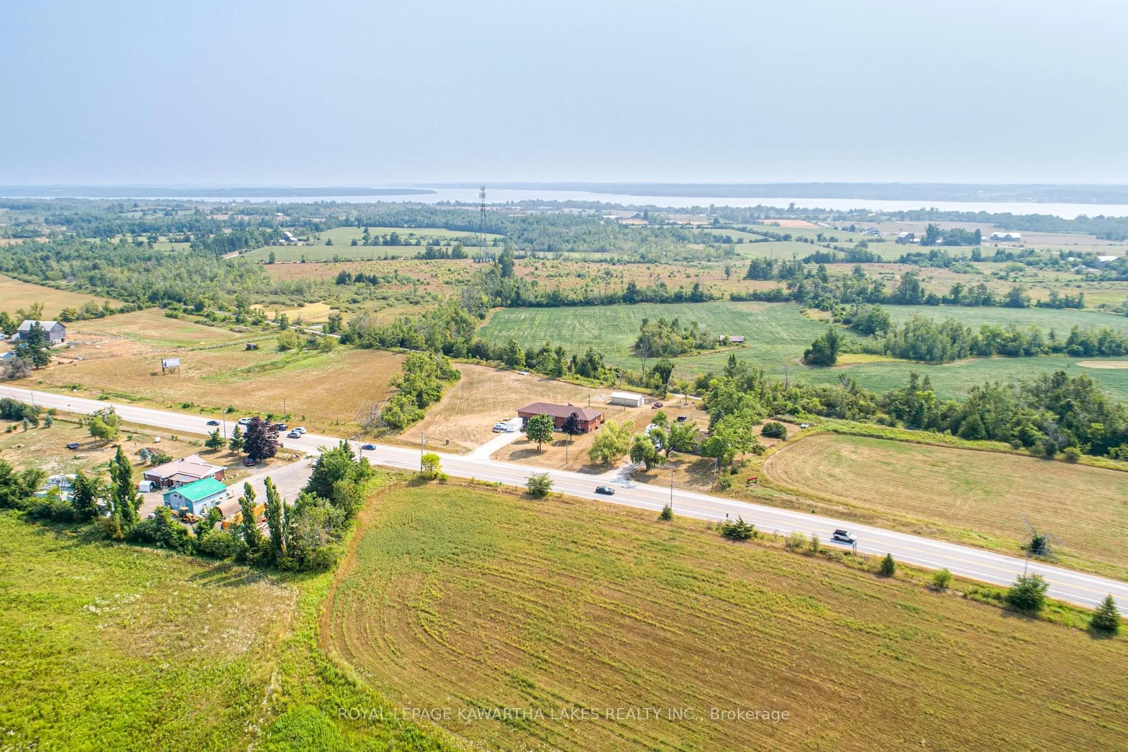 A pic from outside/outdoor area/front of a property/back of a property/a pic from drone, water/lake/river/ocean view for 4170 Hwy 35, Kawartha Lakes Ontario K0M 1G0