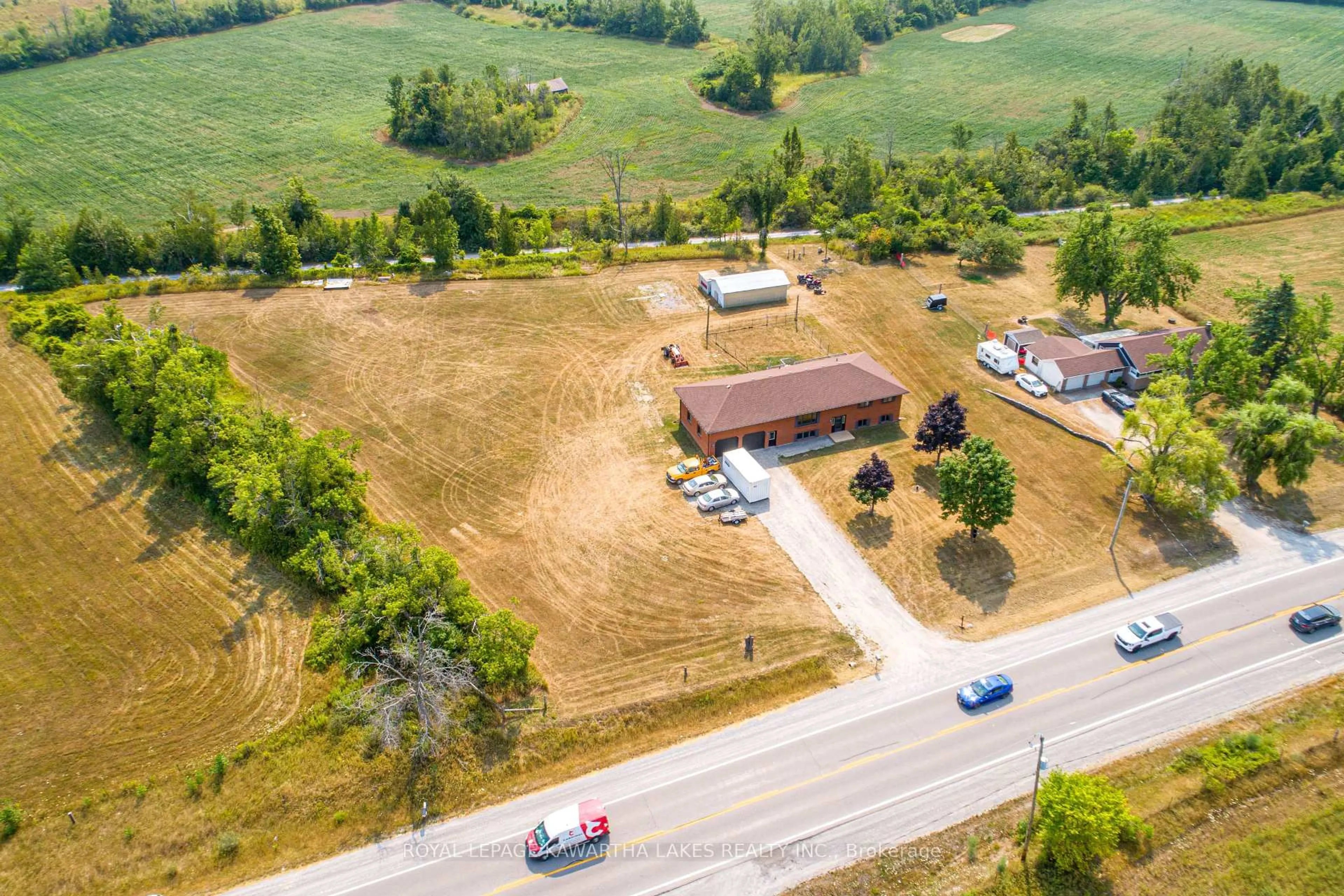A pic from outside/outdoor area/front of a property/back of a property/a pic from drone, unknown for 4170 Hwy 35, Kawartha Lakes Ontario K0M 1G0