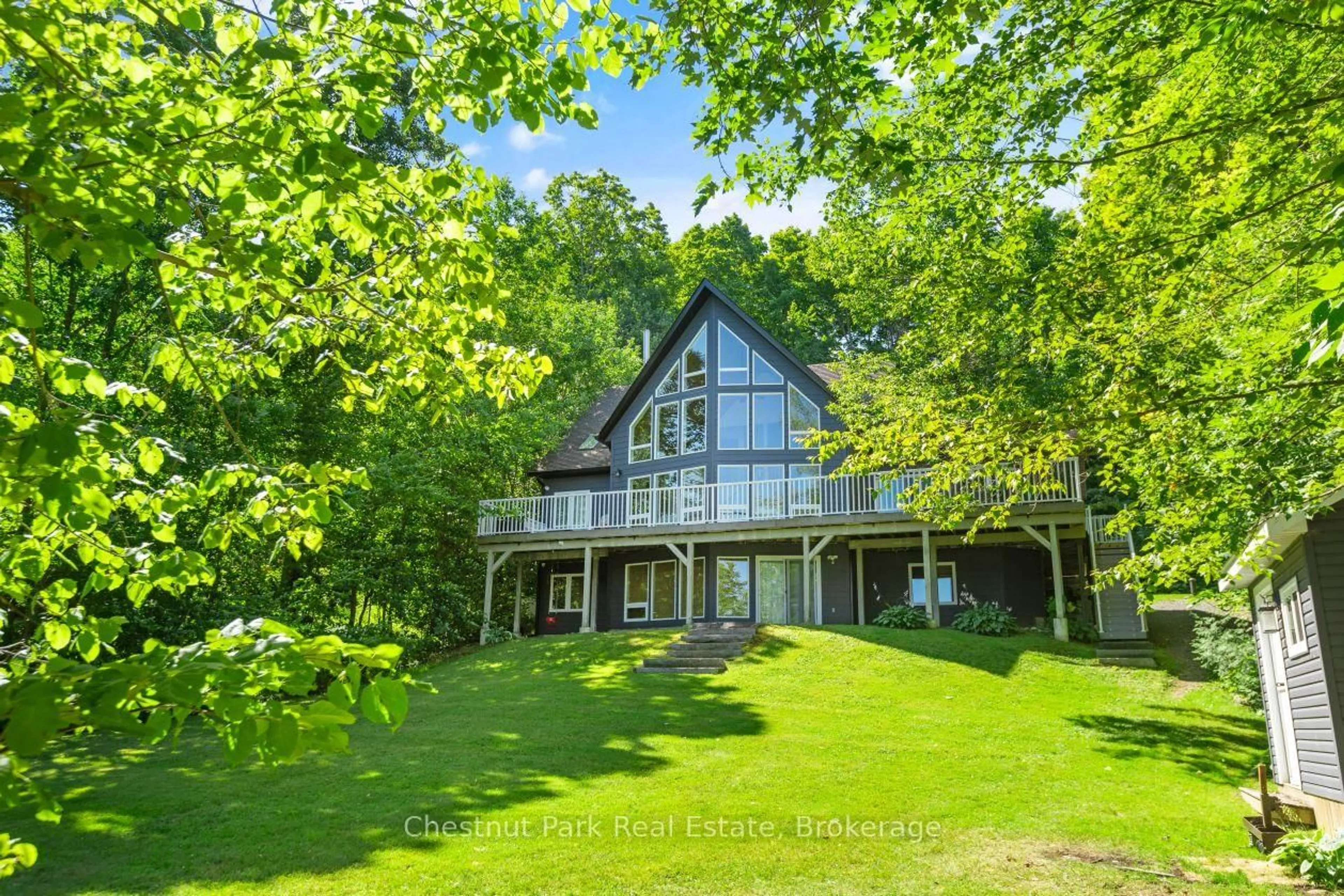 A pic from outside/outdoor area/front of a property/back of a property/a pic from drone, unknown for 1234 Shea Rd #2, Muskoka Lakes Ontario P0B 1M0