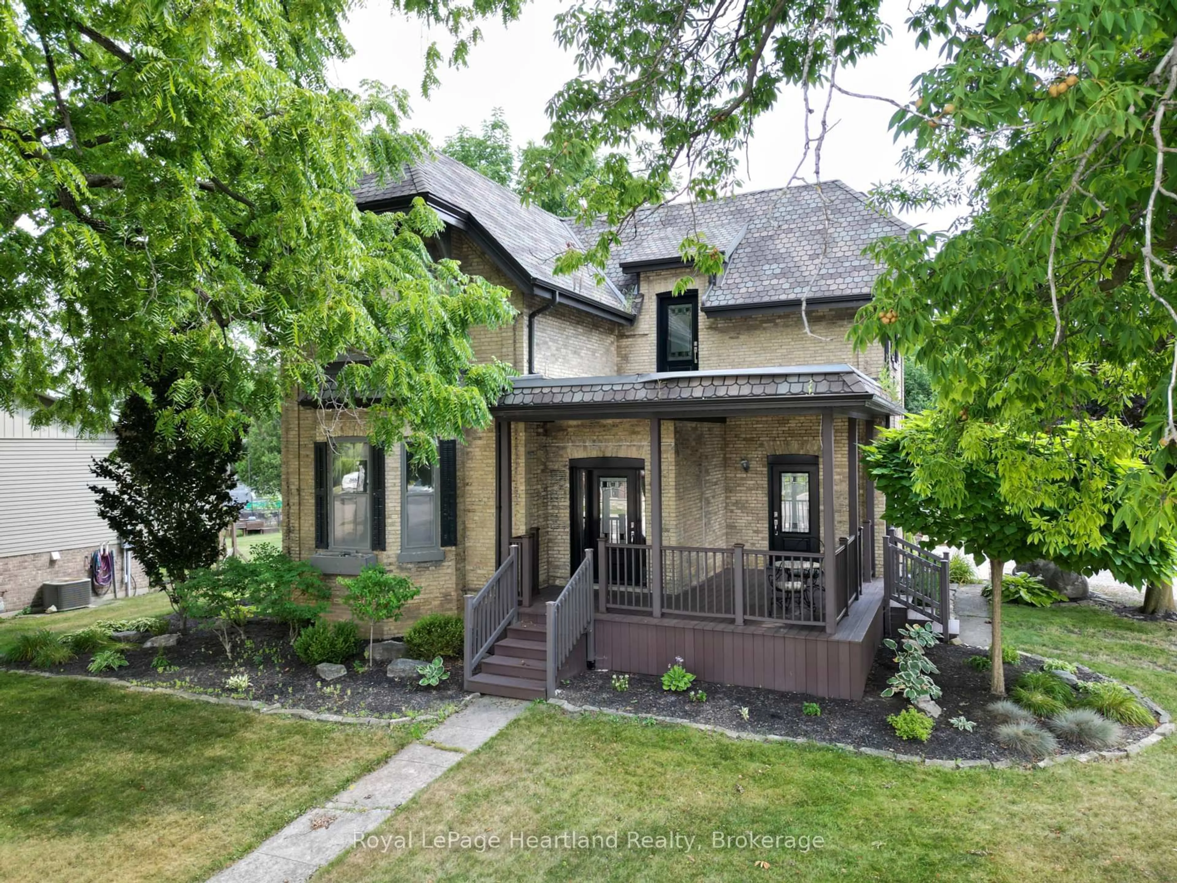 Home with brick exterior material, street for 58 Main St, South Huron Ontario N0M 1S1