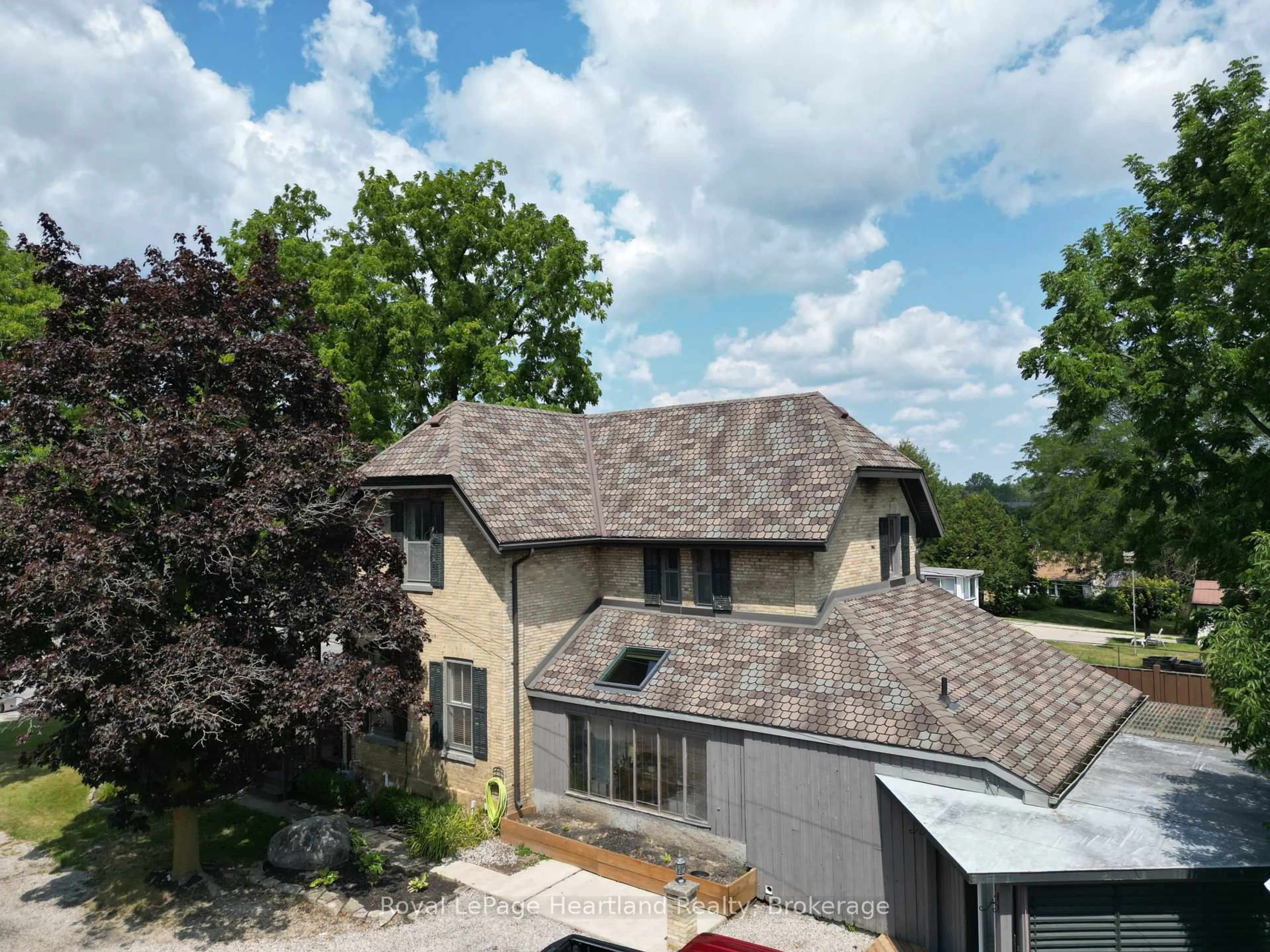 A pic from outside/outdoor area/front of a property/back of a property/a pic from drone, unknown for 58 Main St, South Huron Ontario N0M 1S1