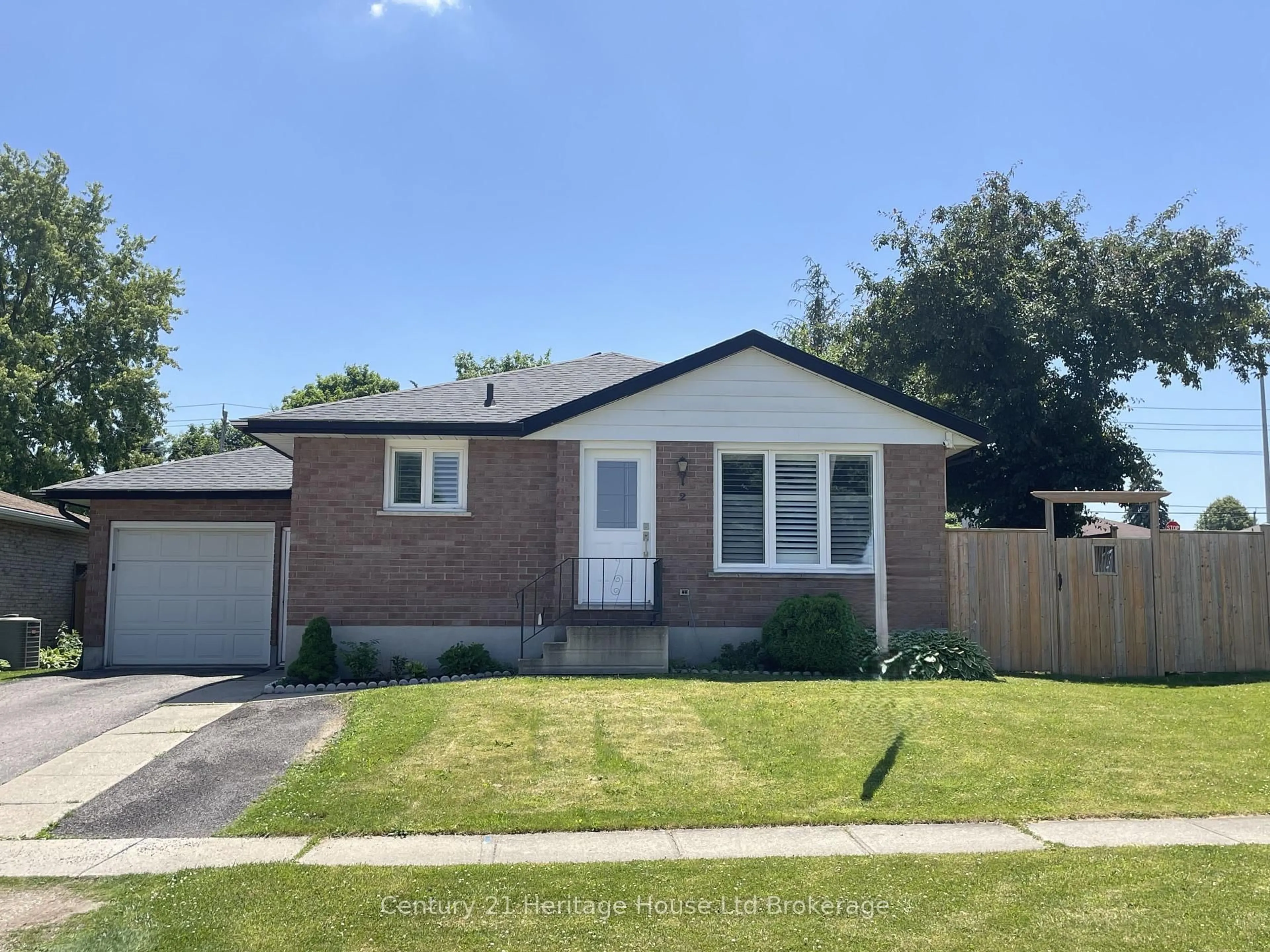 Home with brick exterior material, street for 2 Chippewa Ave, Woodstock Ontario N4T 1A1
