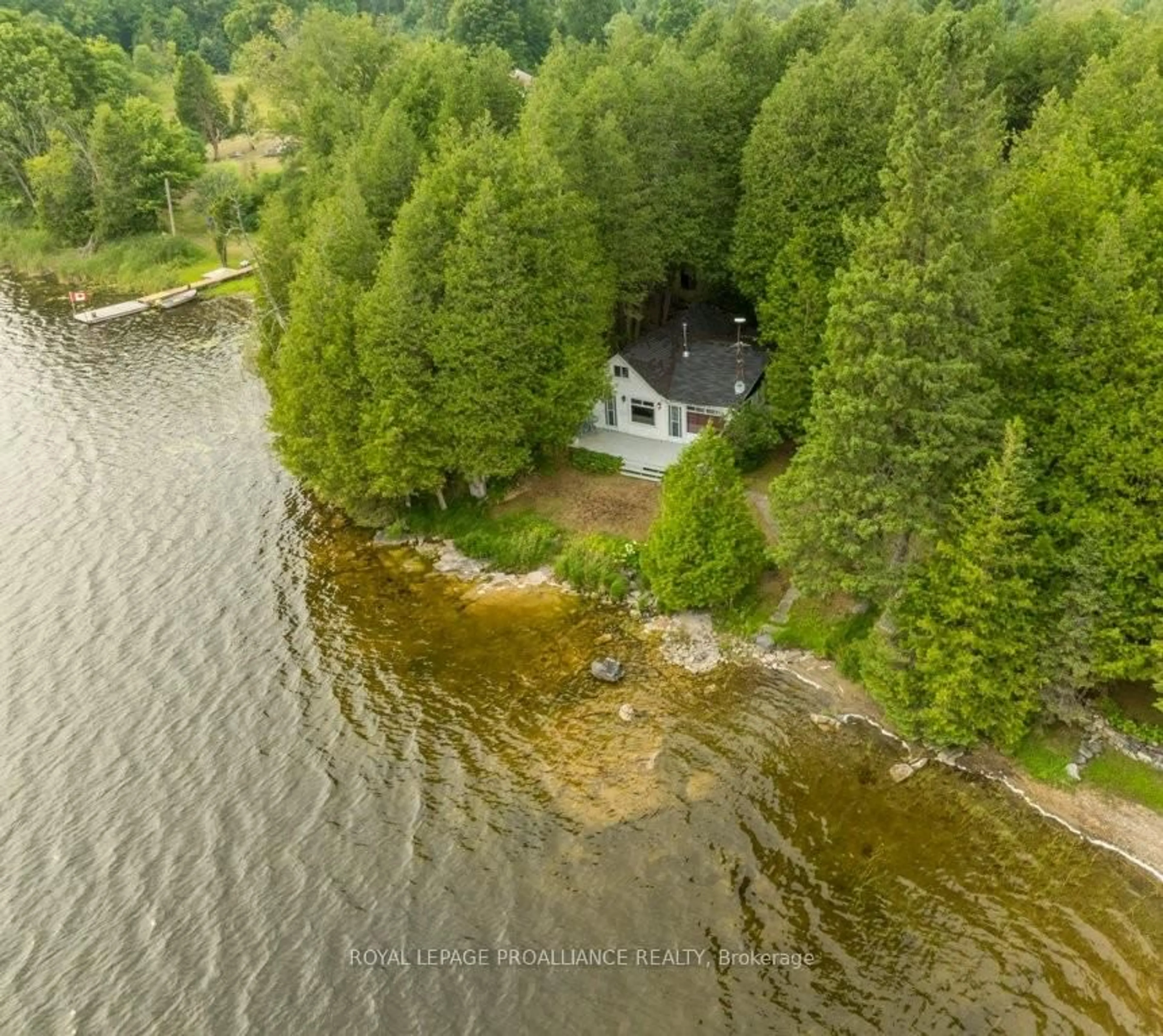 A pic from outside/outdoor area/front of a property/back of a property/a pic from drone, water/lake/river/ocean view for 1087C Hills Lake Rd, Plevna Ontario K0H 2M0
