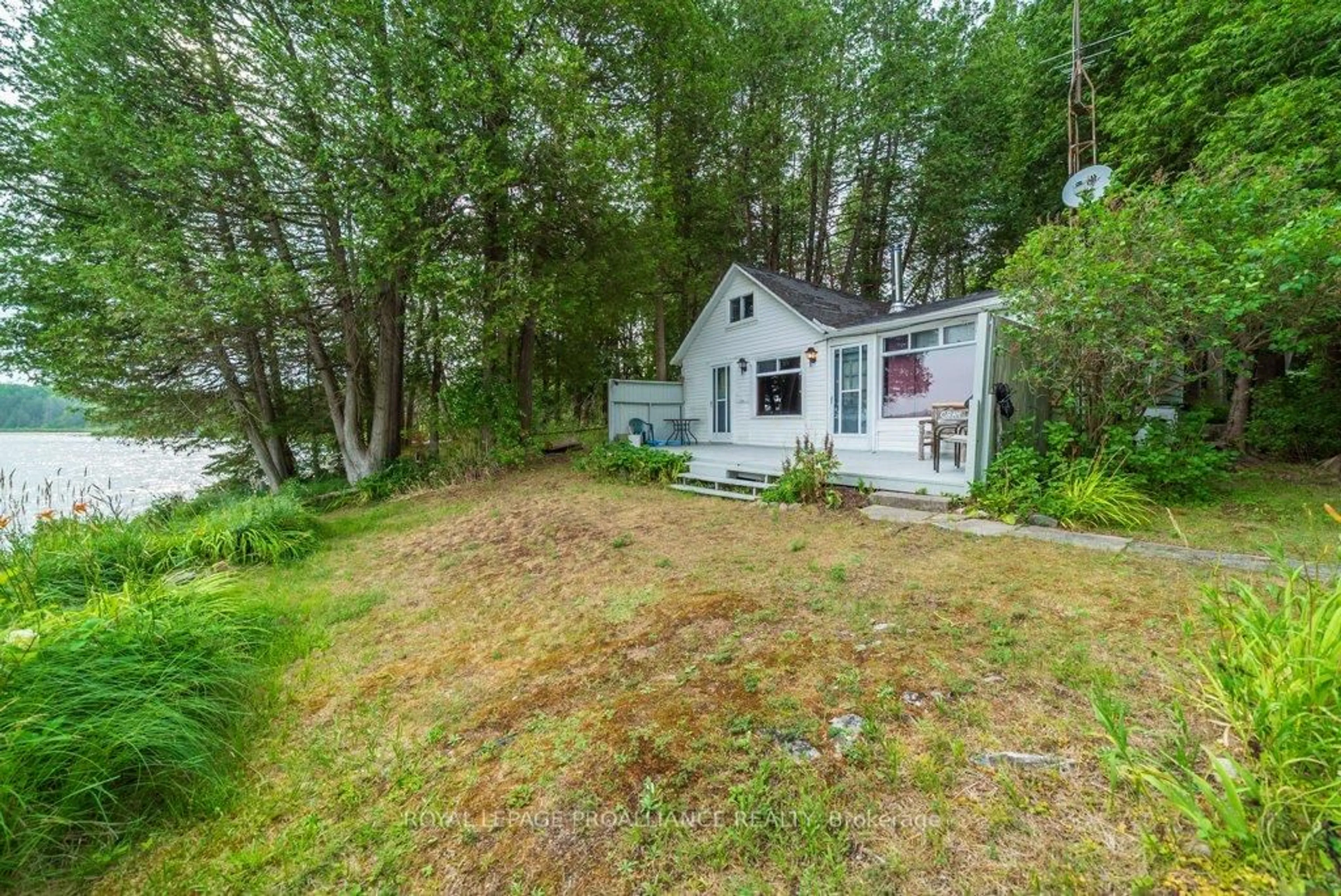 A pic from outside/outdoor area/front of a property/back of a property/a pic from drone, water/lake/river/ocean view for 1087C Hills Lake Rd, Plevna Ontario K0H 2M0