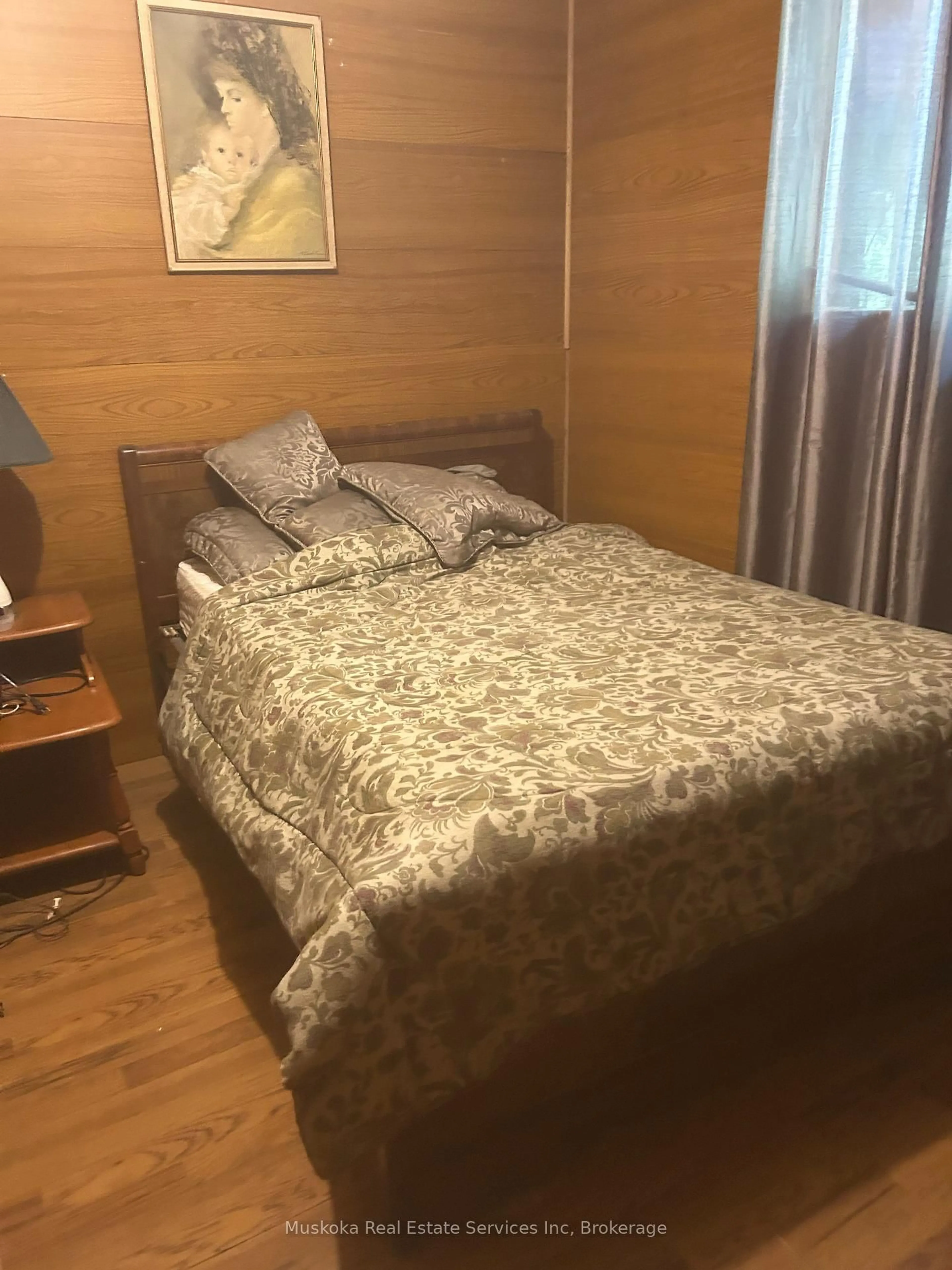 Bedroom with bed, wood/laminate floor for 1073 Fire Route A1 Dr, Gravenhurst Ontario P1P 1R3