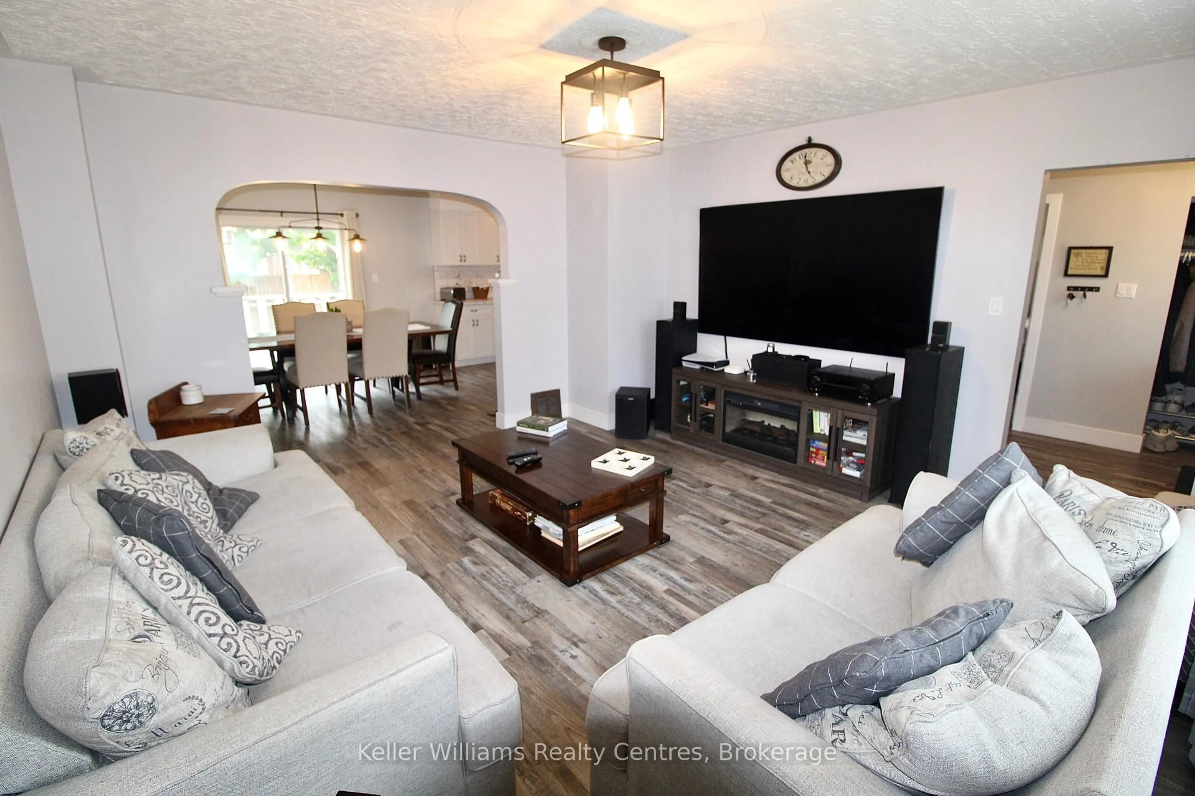 Living room with furniture, wood/laminate floor for 445 13th St, Hanover Ontario N4N 1Y2