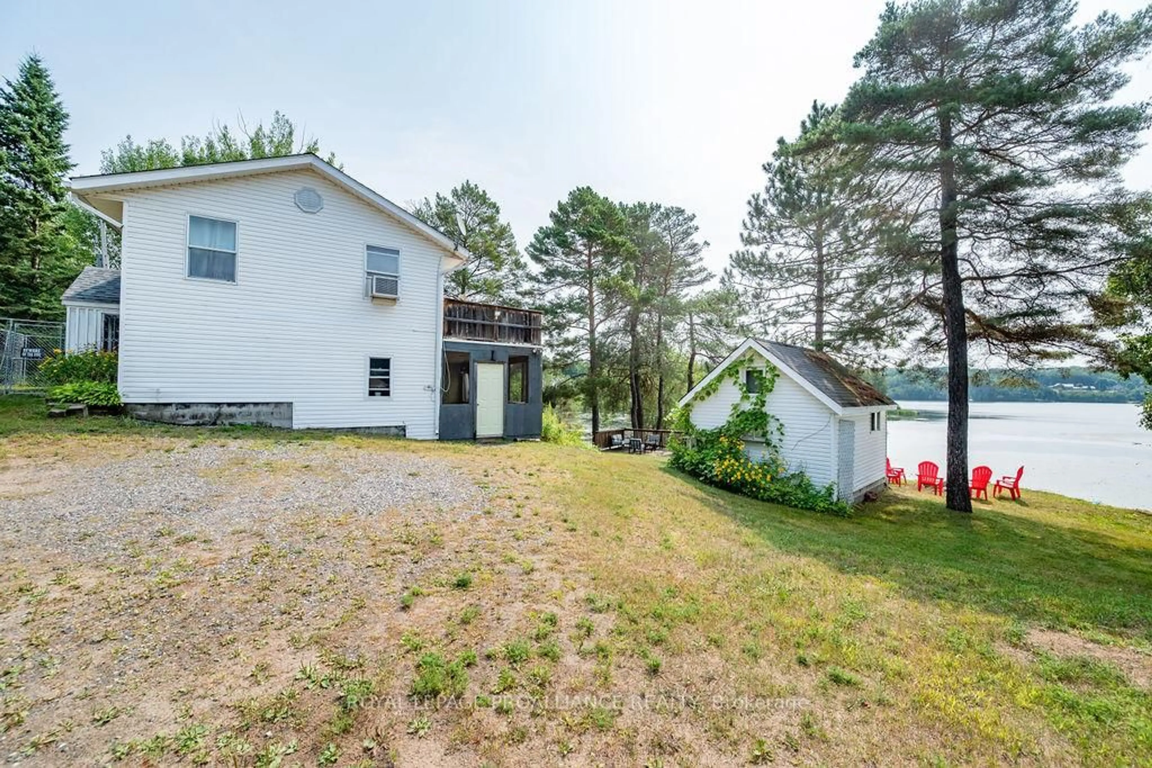 A pic from outside/outdoor area/front of a property/back of a property/a pic from drone, water/lake/river/ocean view for 19 Lambert Rd, Cloyne Ontario K0H 1K0