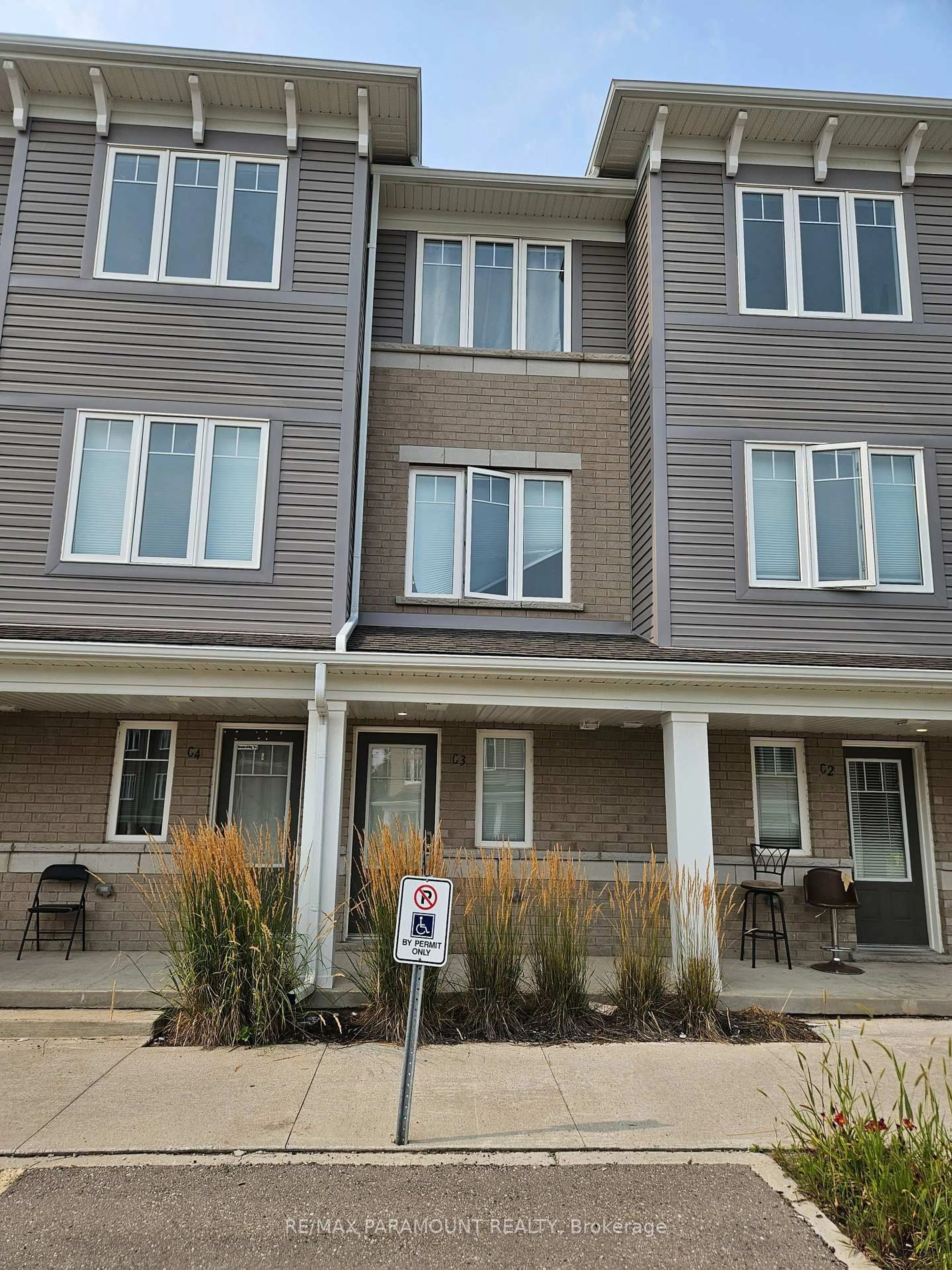 Home with vinyl exterior material, street for 24 Morrison Rd #C3, Kitchener Ontario N2A 0L1