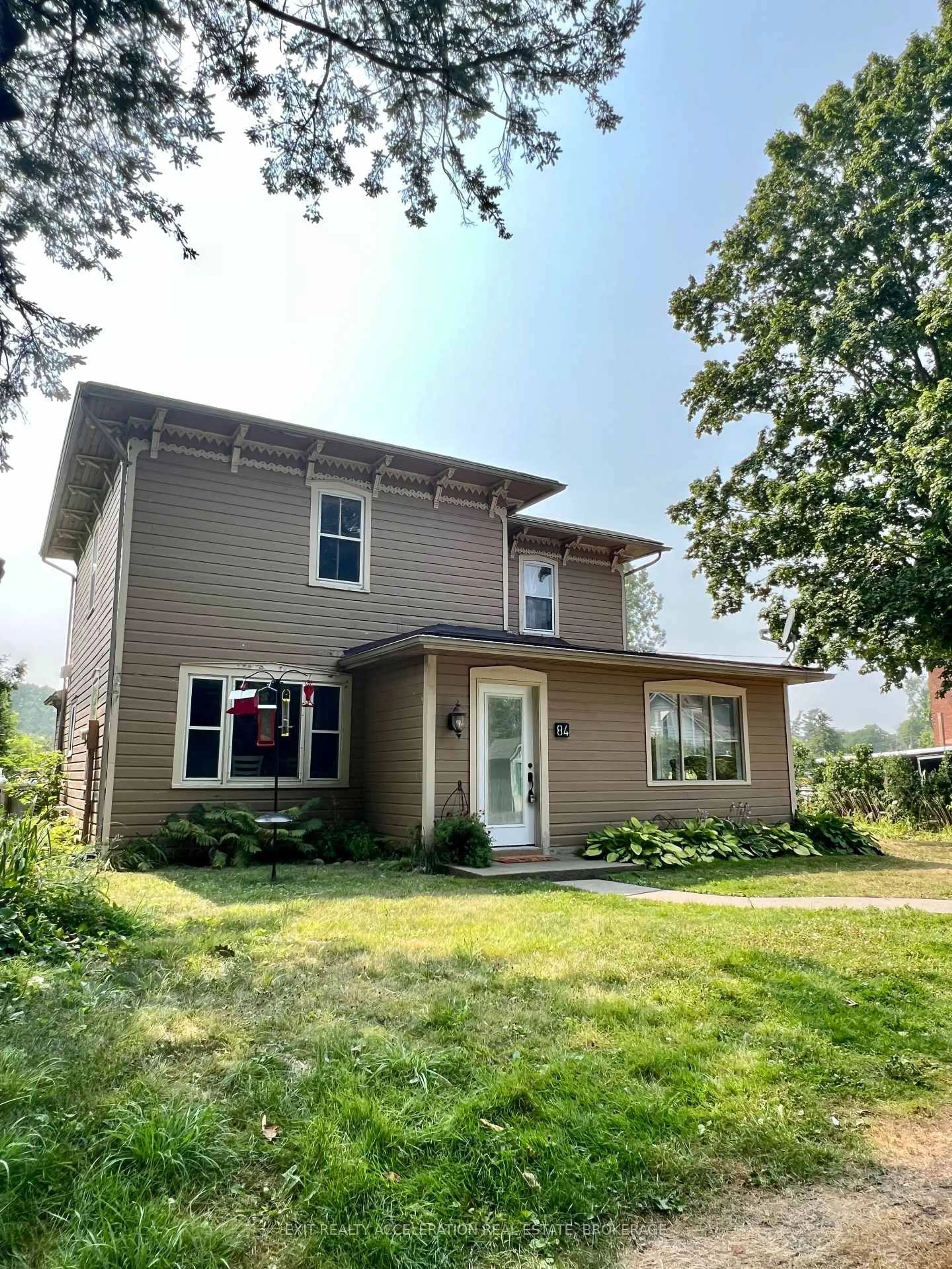 Home with vinyl exterior material, street for 84 Johnson St, Napanee Ontario K0K 1J0
