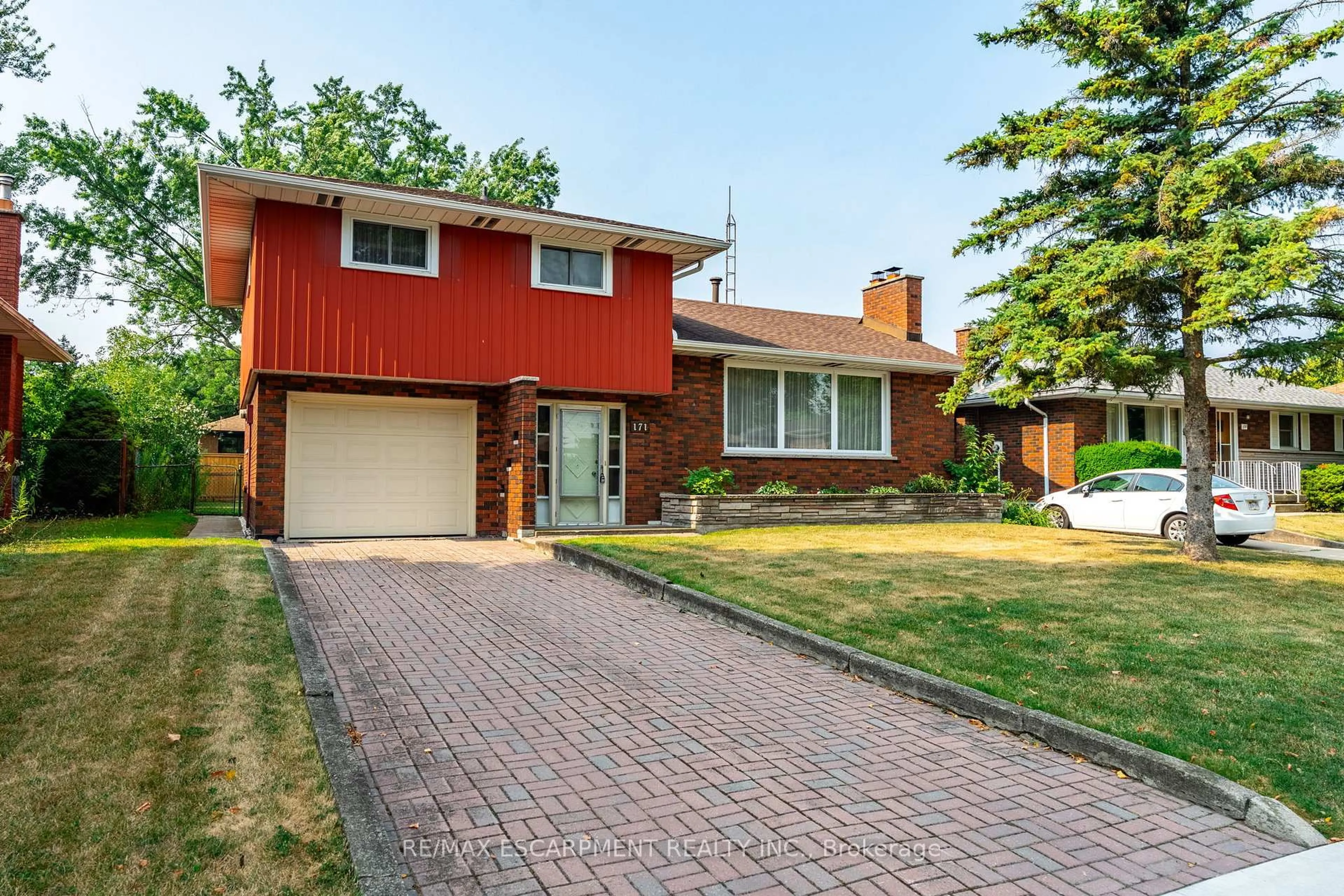 Home with brick exterior material, street for 171 Bendamere Ave, Hamilton Ontario L9C 1N6