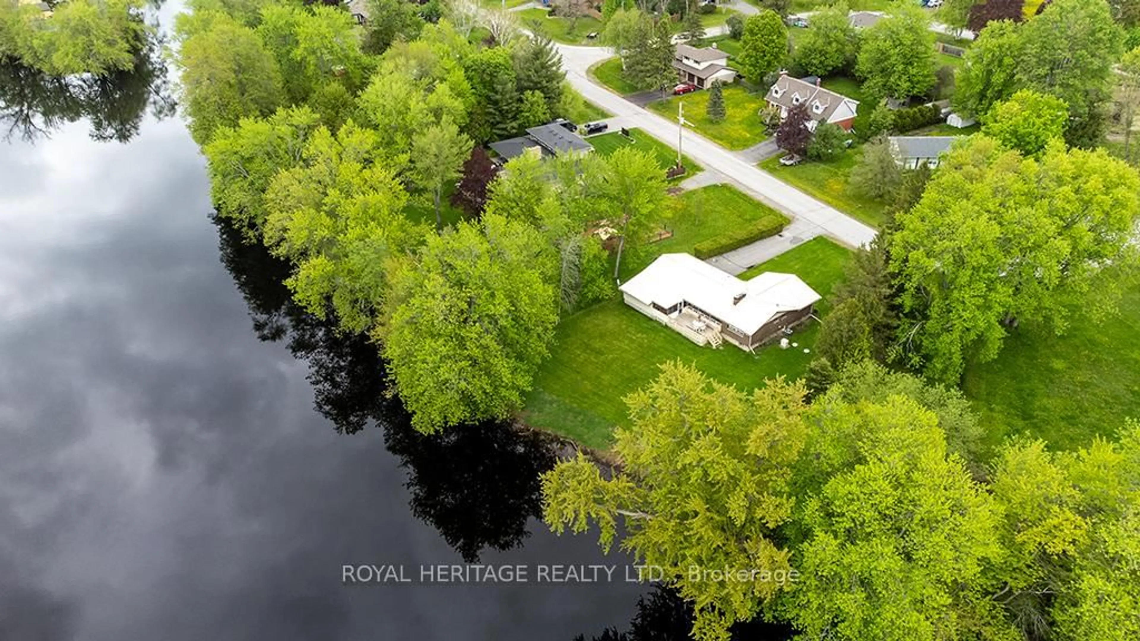 A pic from outside/outdoor area/front of a property/back of a property/a pic from drone, water/lake/river/ocean view for 80 Greenfield Park, Corbyville Ontario K0K 1V0