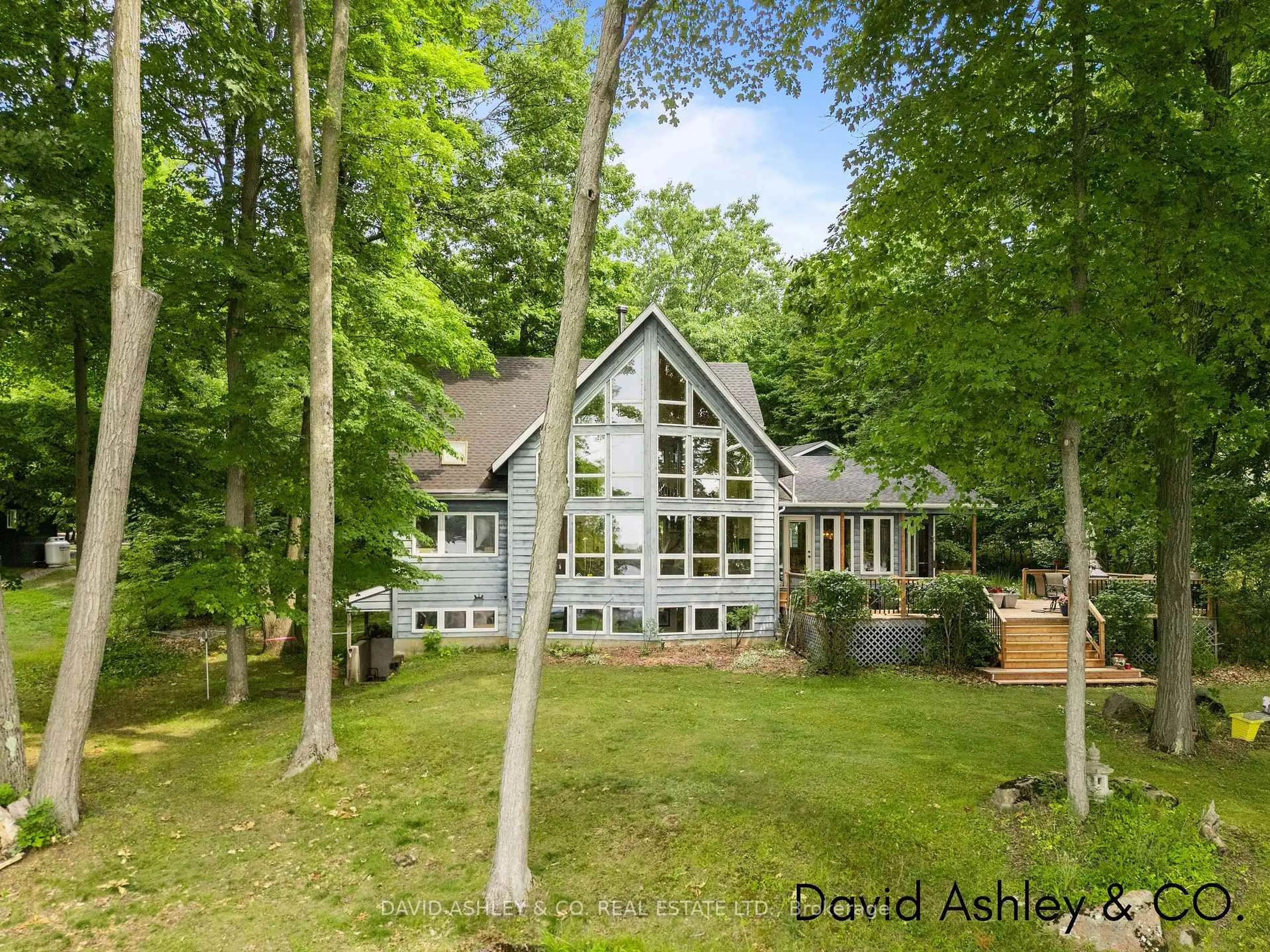 A pic from outside/outdoor area/front of a property/back of a property/a pic from drone, forest/trees view for 489 Tracy's Point Rd, Rideau Lakes Ontario K7H 3C5