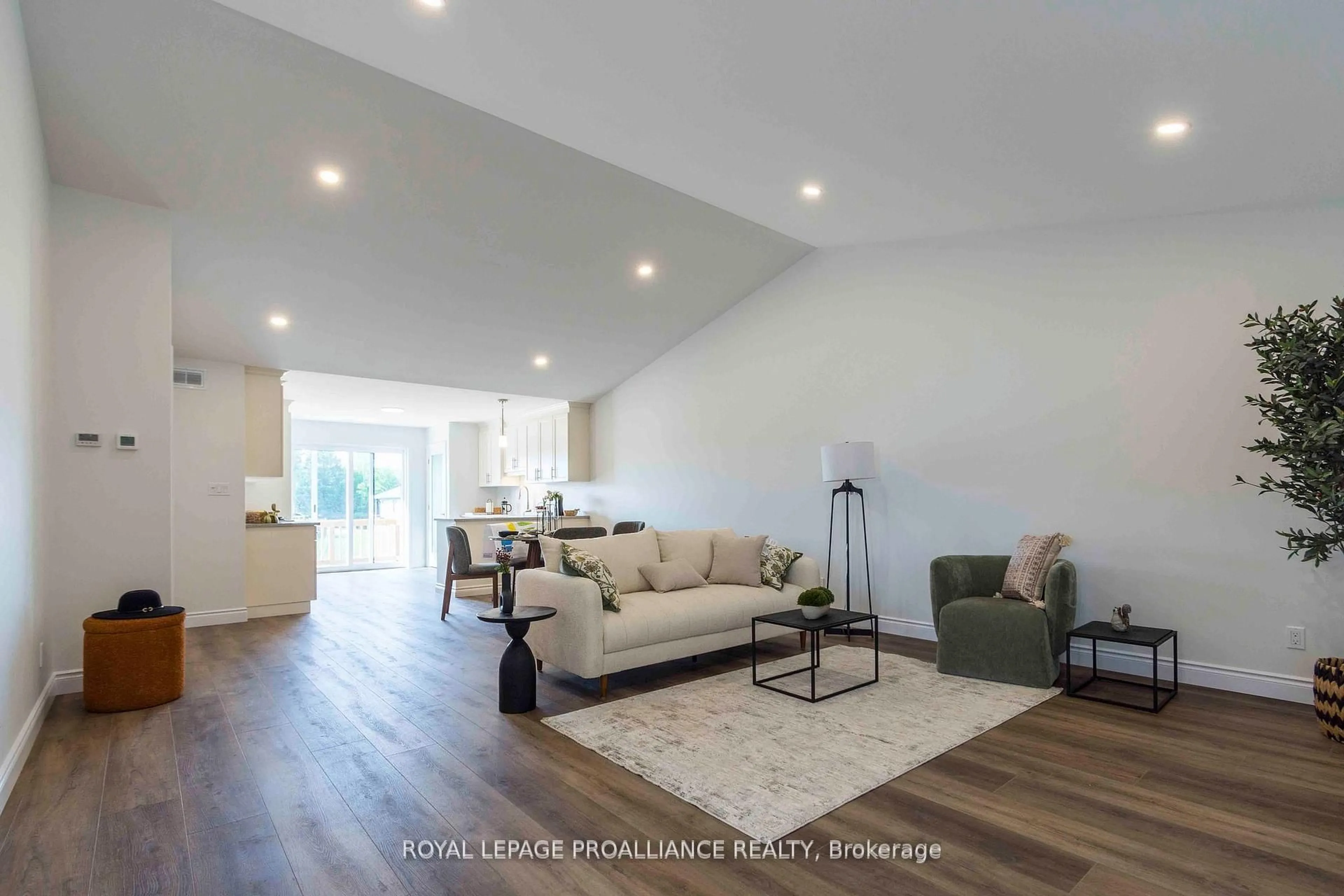Living room with furniture, wood/laminate floor for 47 Mackenzie John Cres, Brighton Ontario K0K 1H0