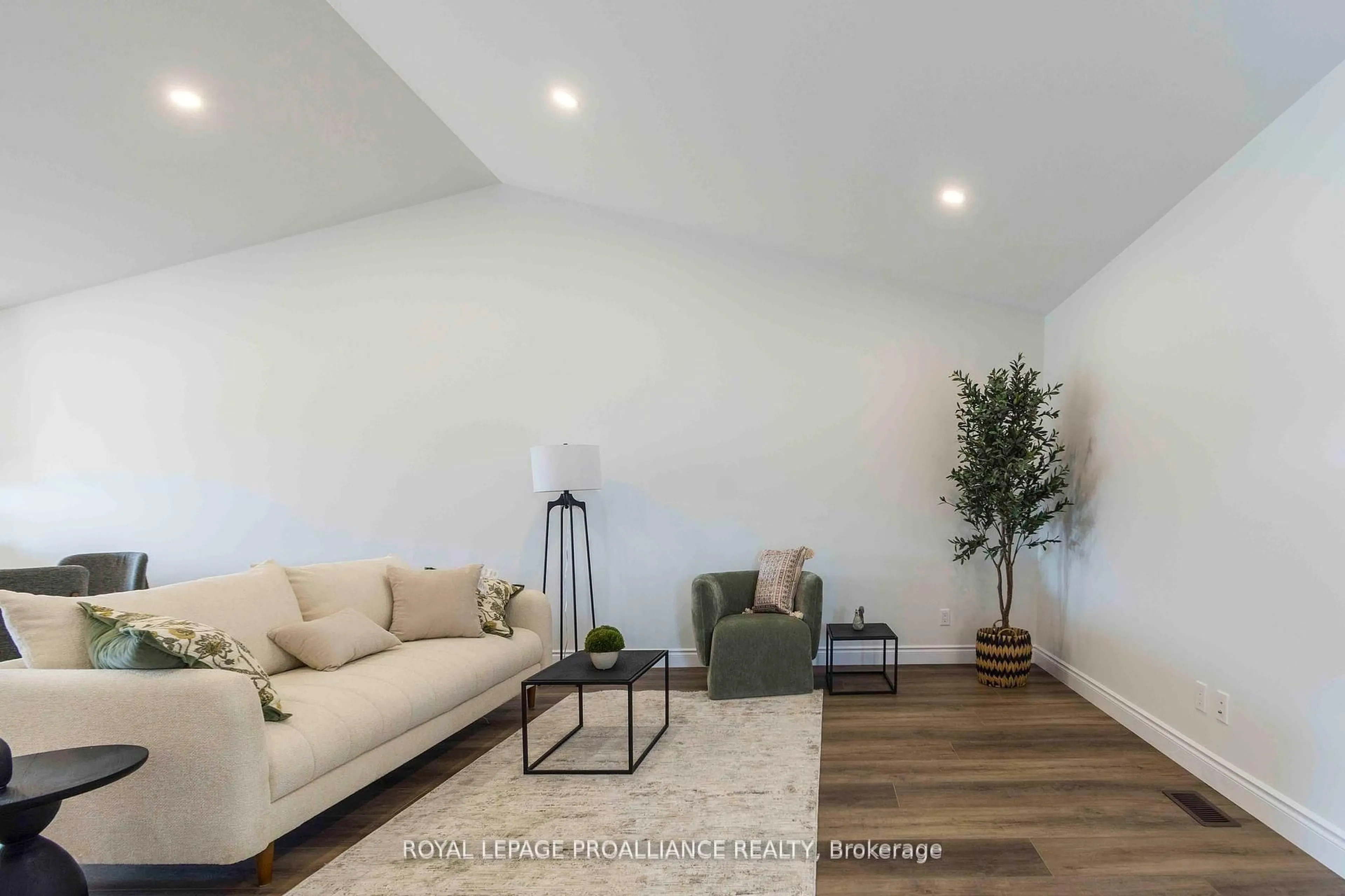 Living room with furniture, wood/laminate floor for 47 Mackenzie John Cres, Brighton Ontario K0K 1H0