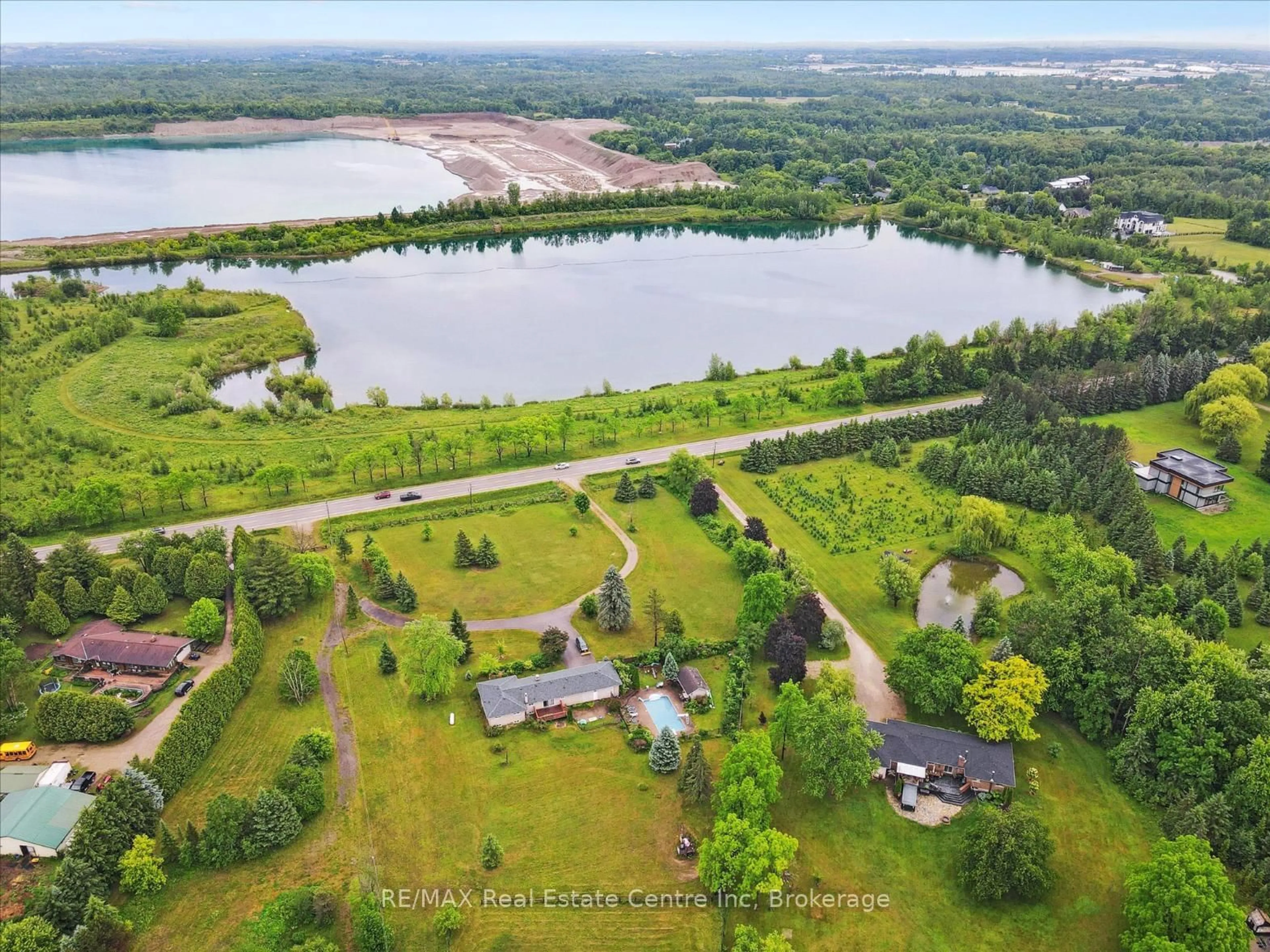 A pic from outside/outdoor area/front of a property/back of a property/a pic from drone, water/lake/river/ocean view for 7648 Wellington Rd 34 Rd, Puslinch Ontario N0B 2J0