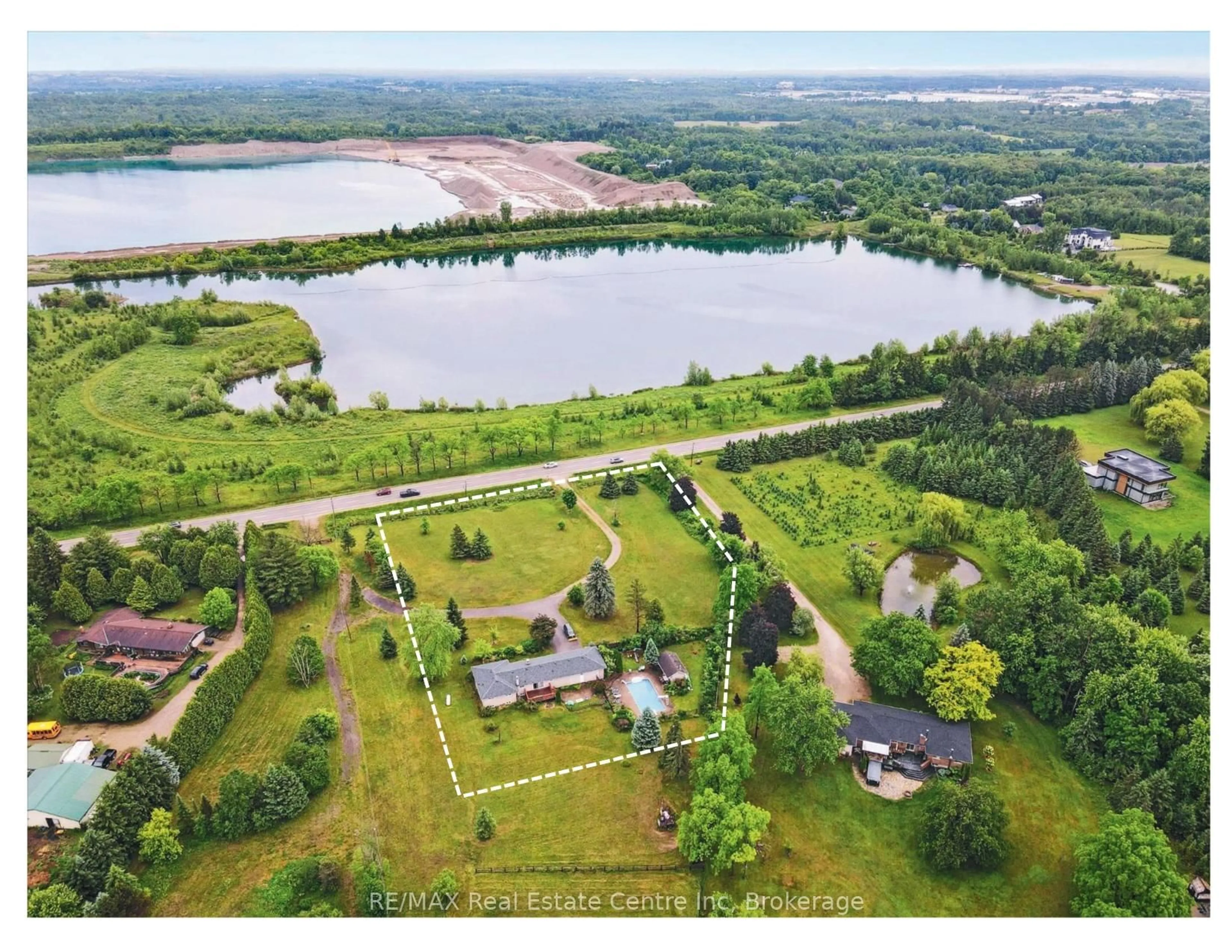 A pic from outside/outdoor area/front of a property/back of a property/a pic from drone, water/lake/river/ocean view for 7648 Wellington Rd 34 Rd, Puslinch Ontario N0B 2J0