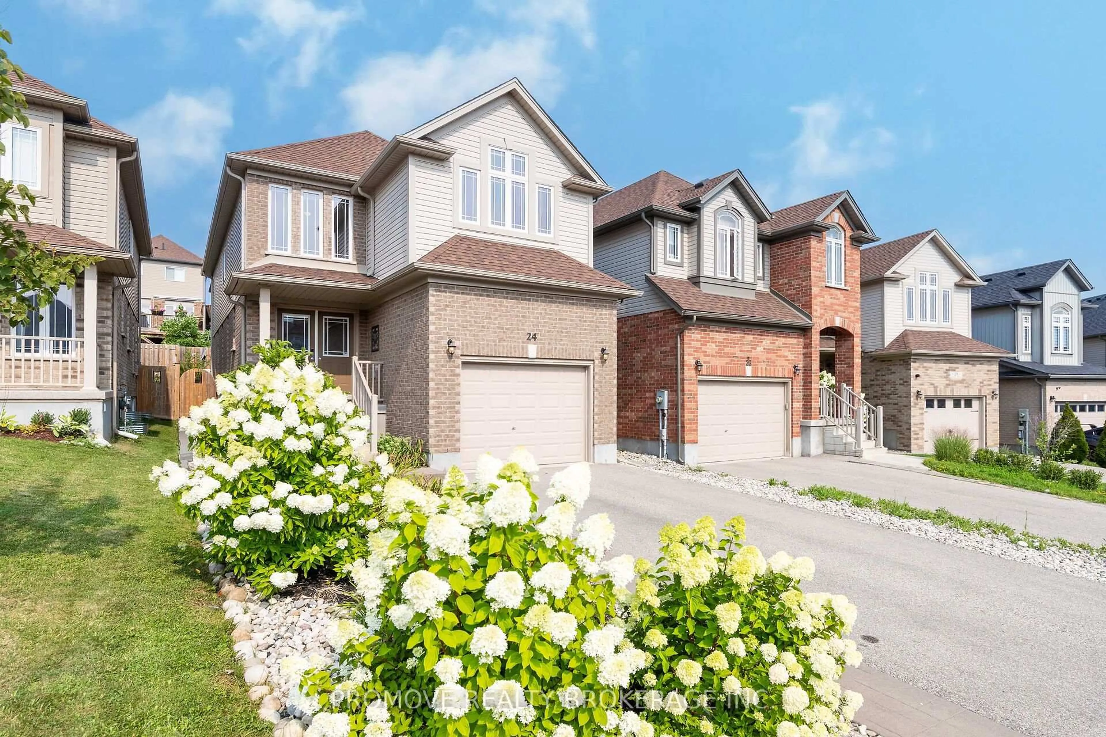 Home with brick exterior material, street for 24 Dudley Dr, Guelph Ontario N1G 0E6