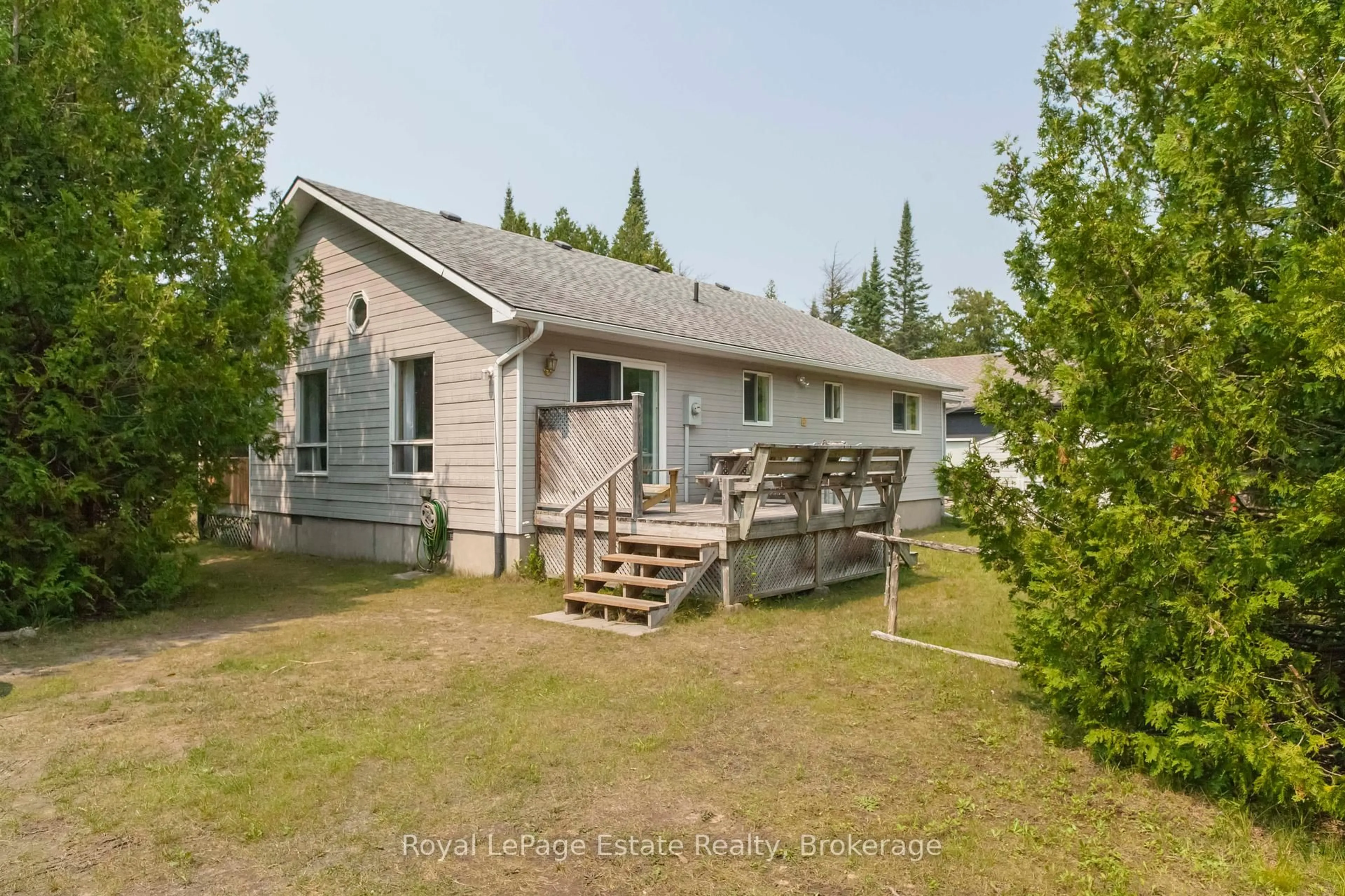 A pic from outside/outdoor area/front of a property/back of a property/a pic from drone, unknown for 503 Bruce Ave, South Bruce Peninsula Ontario N0H 2G0