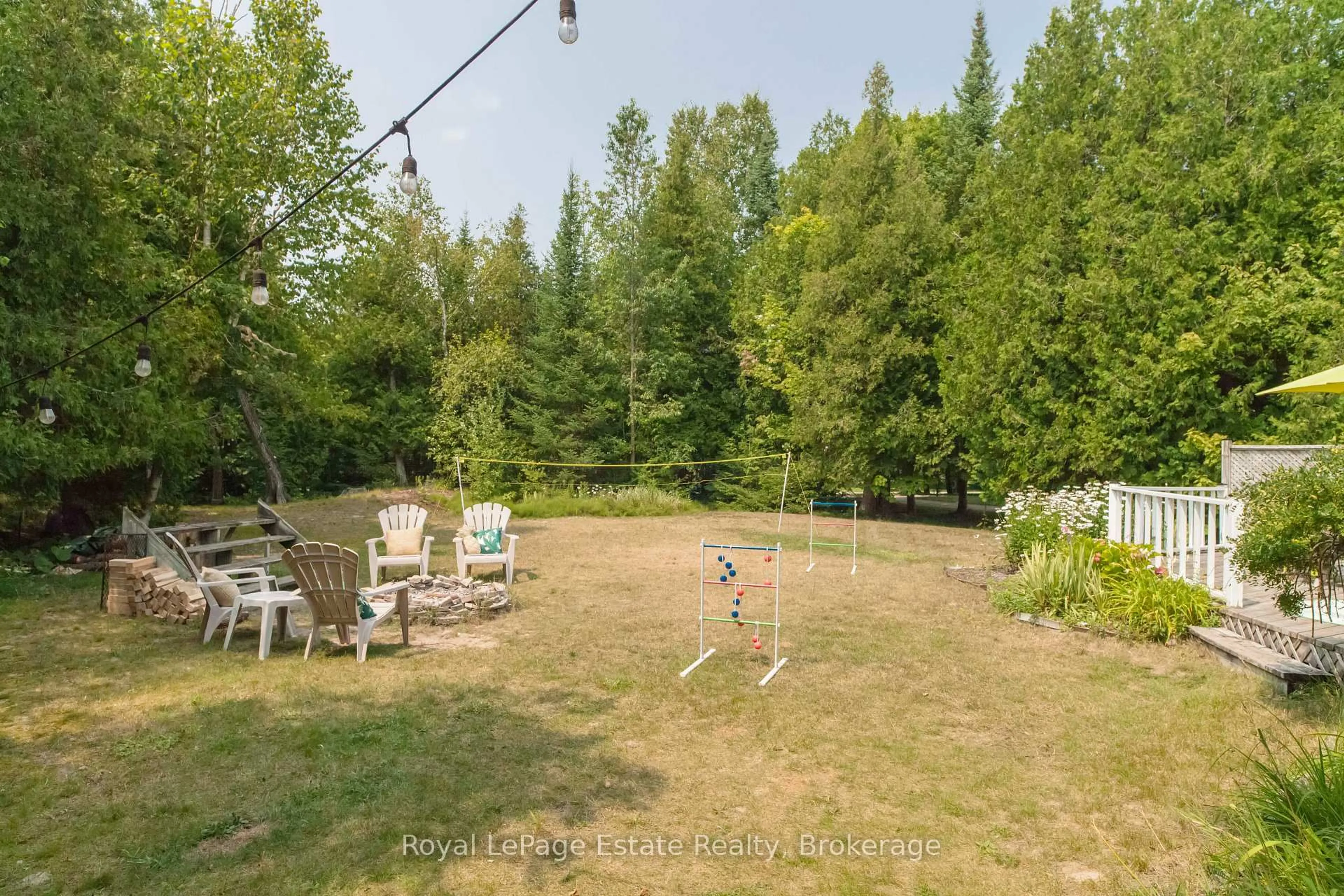 A pic from outside/outdoor area/front of a property/back of a property/a pic from drone, forest/trees view for 503 Bruce Ave, South Bruce Peninsula Ontario N0H 2G0