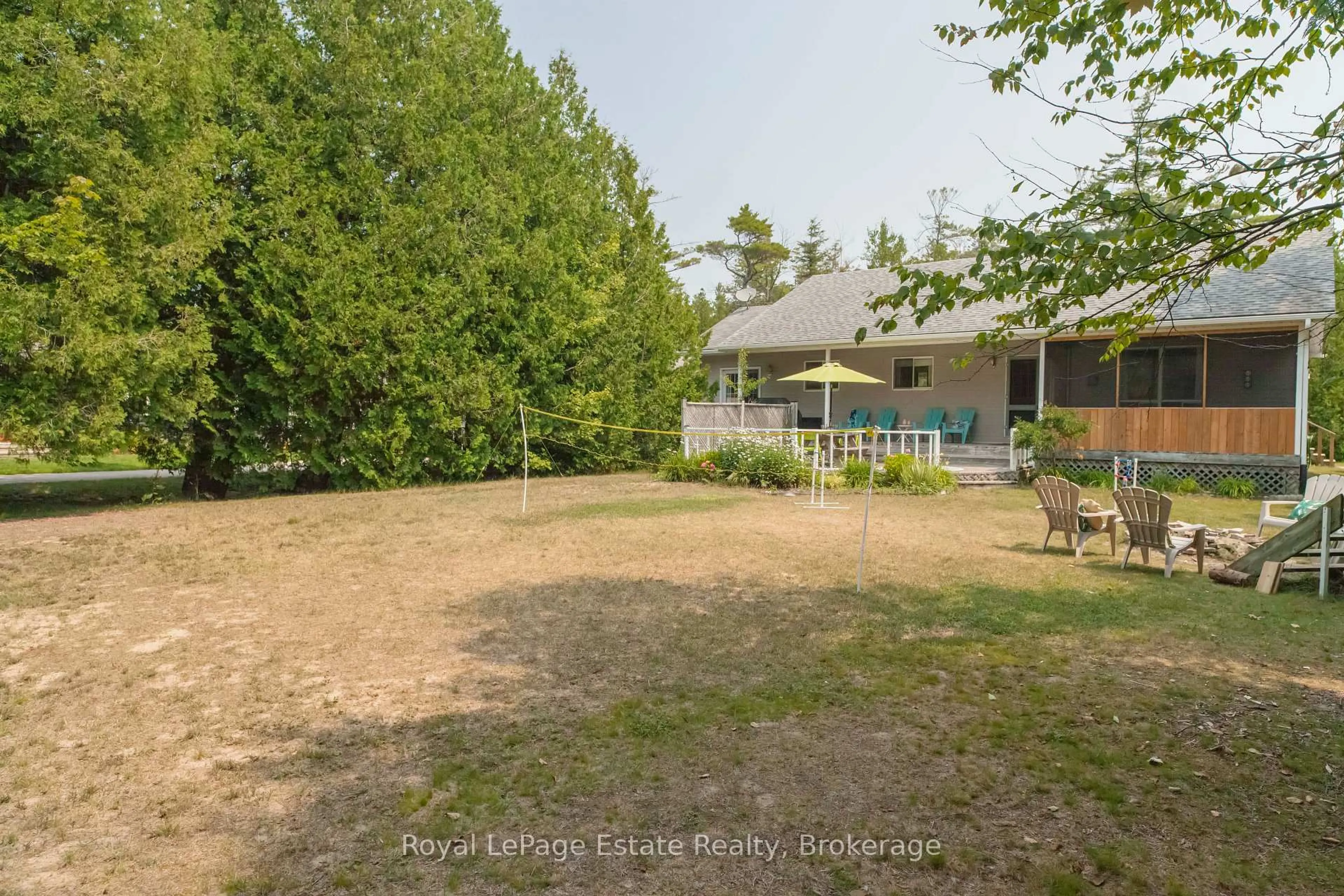 A pic from outside/outdoor area/front of a property/back of a property/a pic from drone, forest/trees view for 503 Bruce Ave, South Bruce Peninsula Ontario N0H 2G0