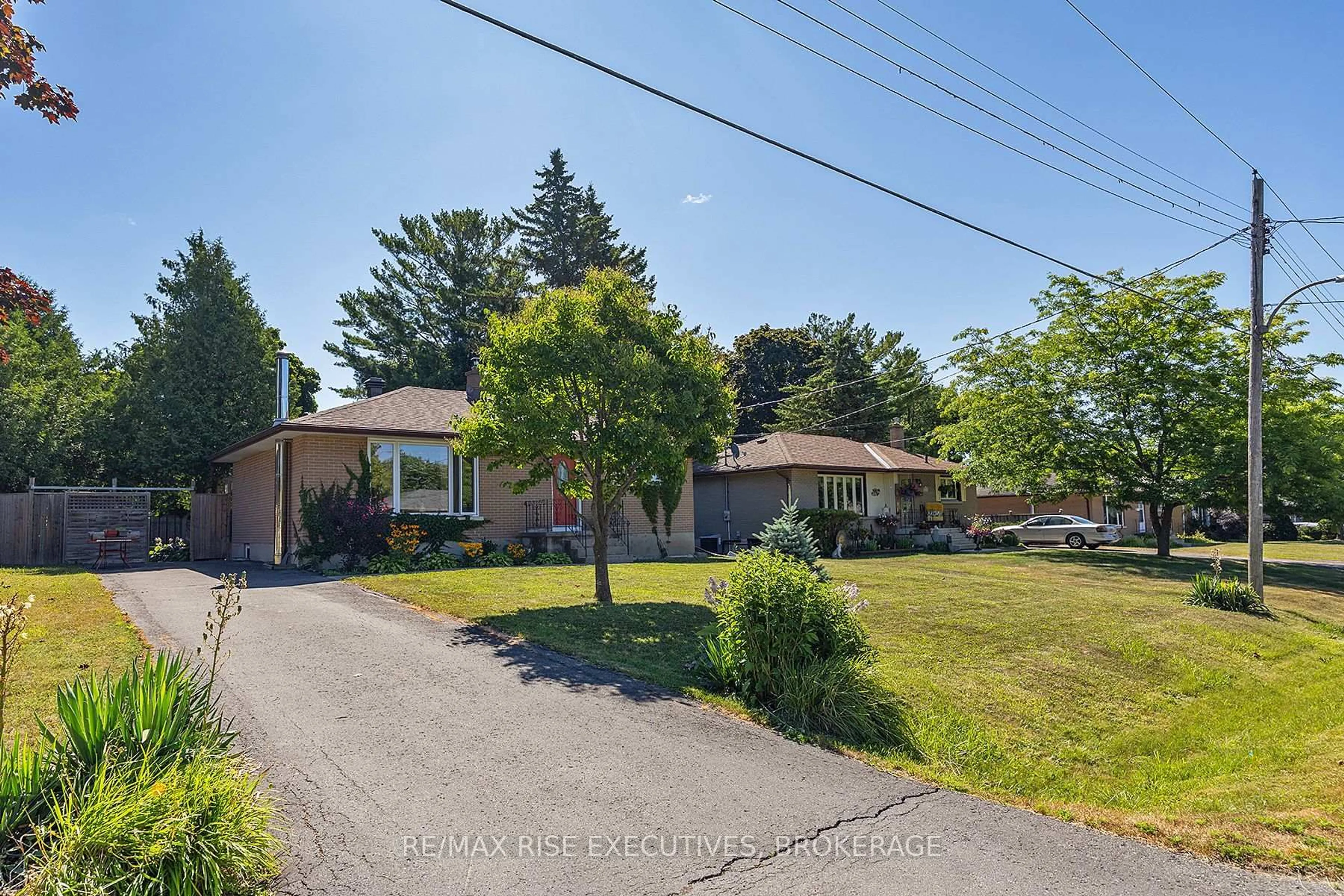 A pic from outside/outdoor area/front of a property/back of a property/a pic from drone, street for 466 Abdo Rd, Kingston Ontario K7M 3W9