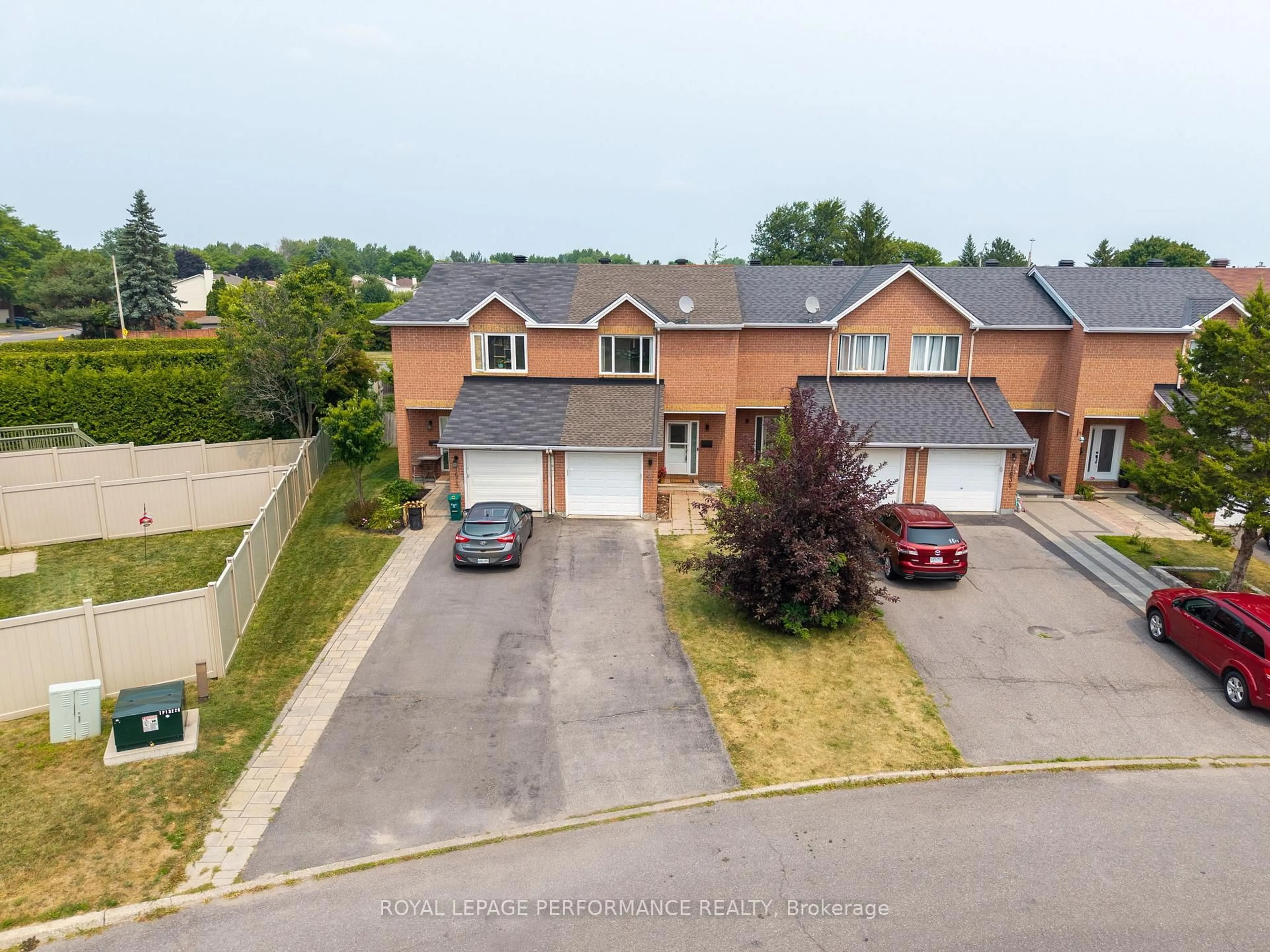 A pic from outside/outdoor area/front of a property/back of a property/a pic from drone, street for 1631 Greywood Dr, Ottawa Ontario K1C 7L9