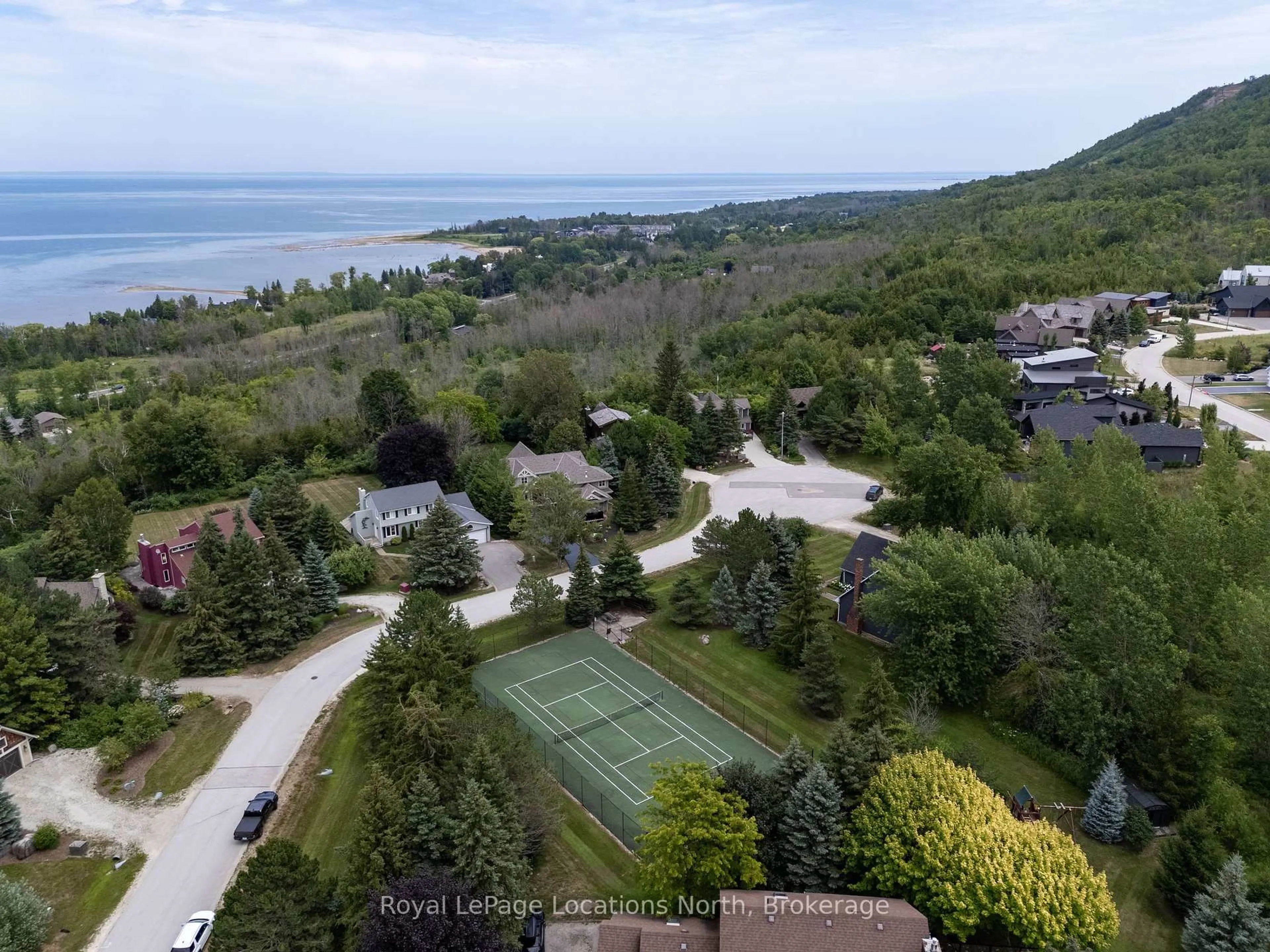 A pic from outside/outdoor area/front of a property/back of a property/a pic from drone, water/lake/river/ocean view for 117 Camperdown Crt, Blue Mountains Ontario N0H 1J0