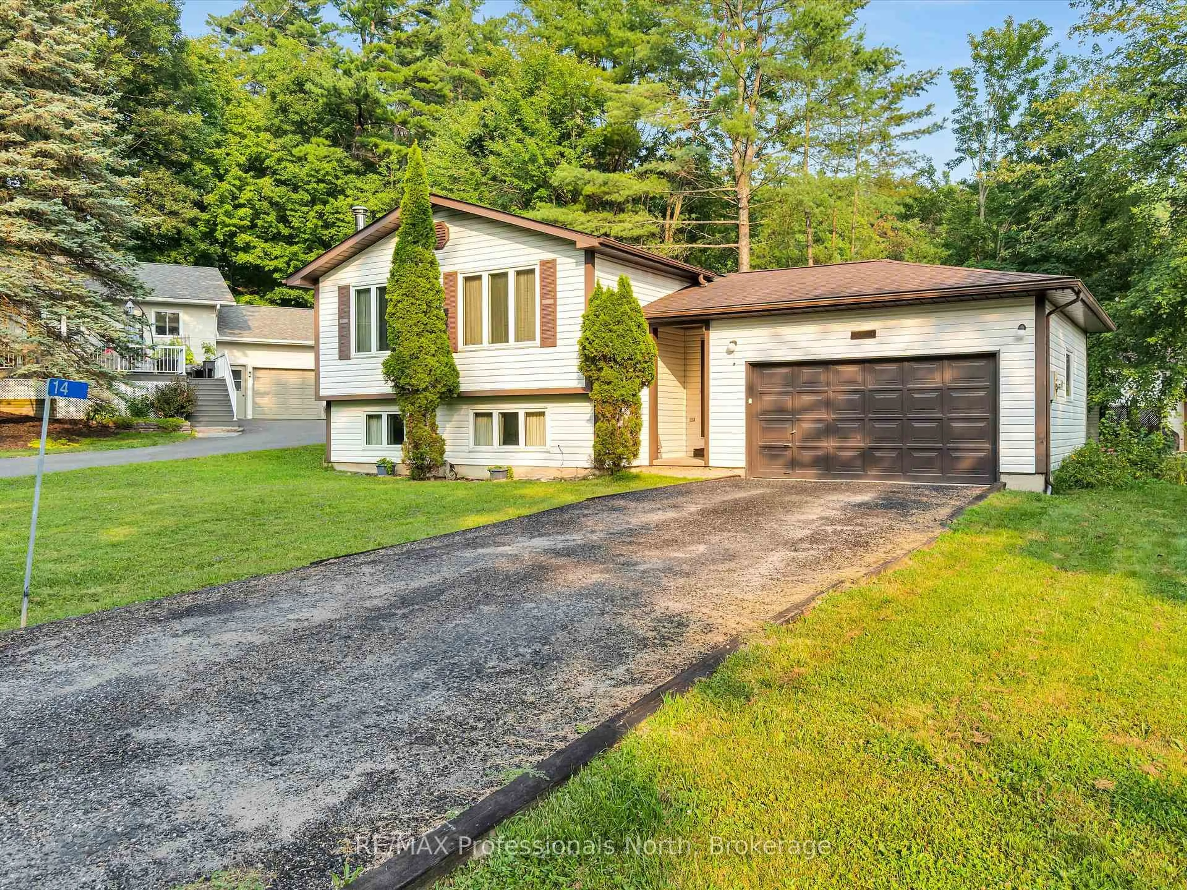 Home with vinyl exterior material, street for 14 Duke St, Muskoka Lakes Ontario P0B 1J0