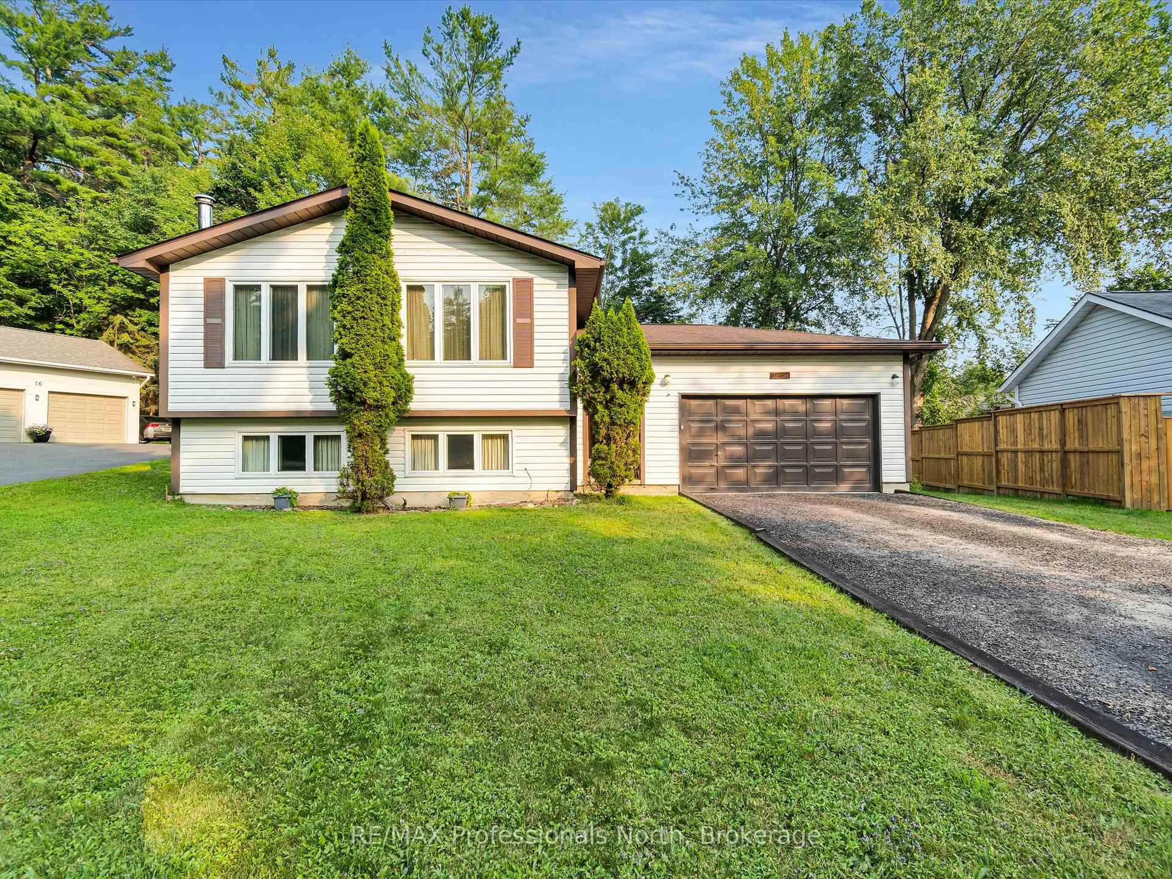 Home with vinyl exterior material, street for 14 Duke St, Muskoka Lakes Ontario P0B 1J0