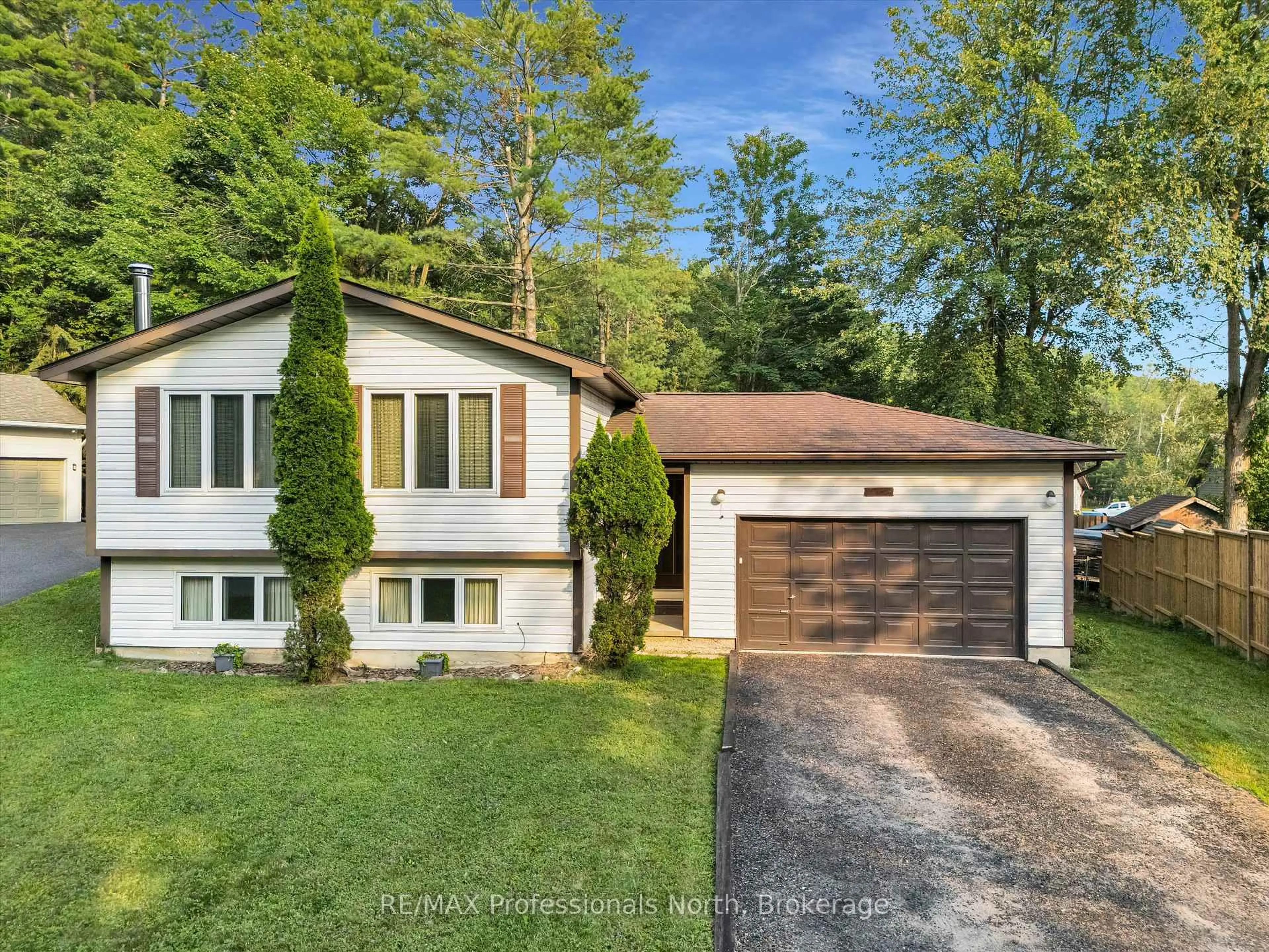 Home with vinyl exterior material, street for 14 Duke St, Muskoka Lakes Ontario P0B 1J0