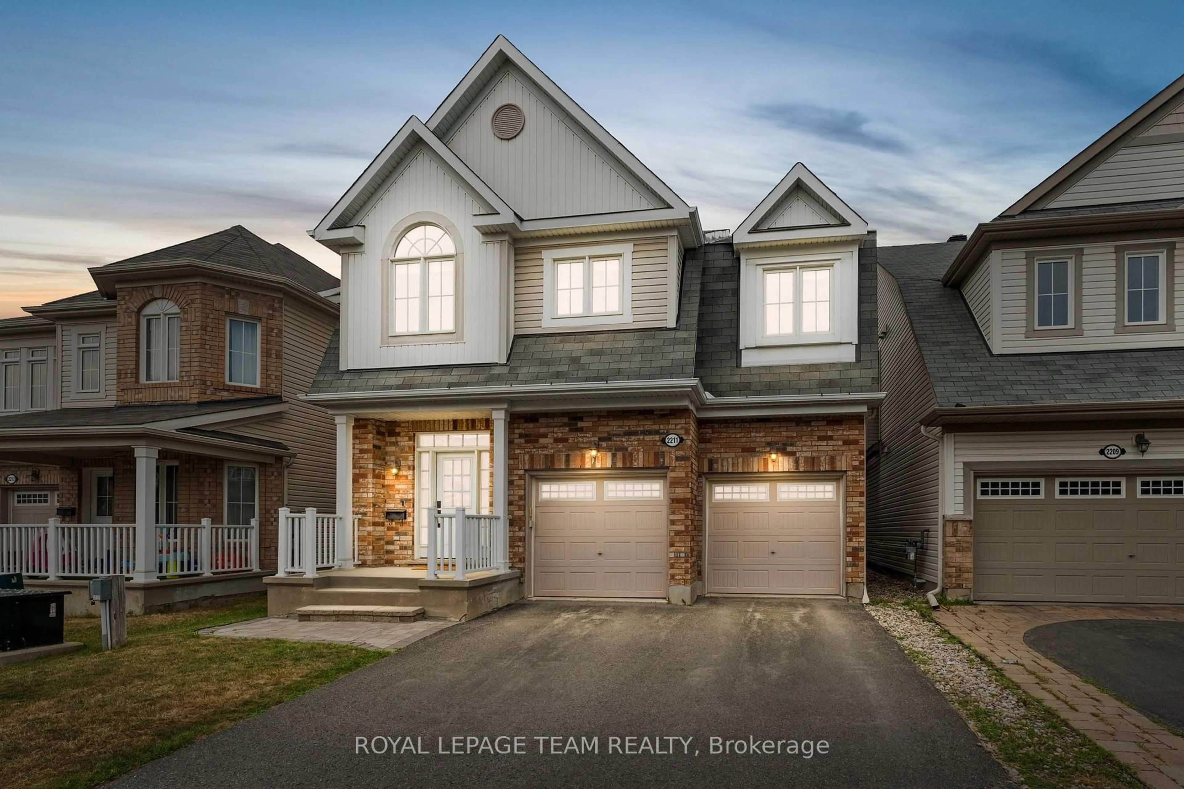 Home with brick exterior material, street for 2211 Watercolours Way, Ottawa Ontario K2J 5J8