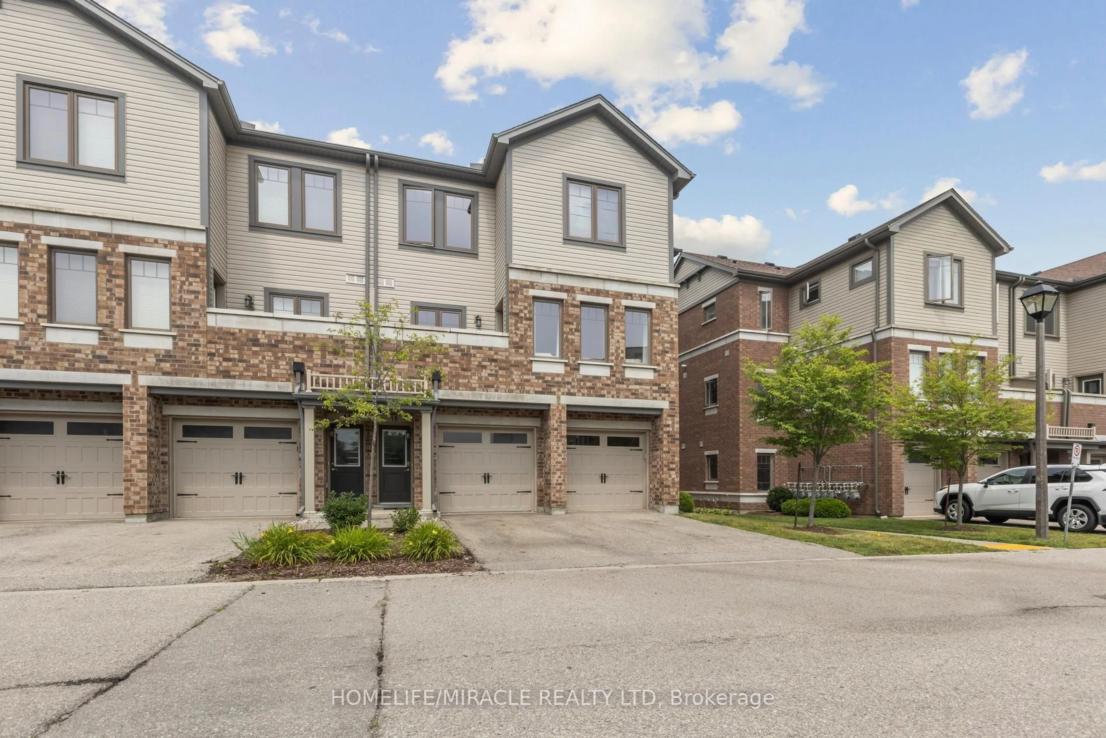 A pic from outside/outdoor area/front of a property/back of a property/a pic from drone, street for 39 Kay Cres #15, Guelph Ontario N1L 1H1