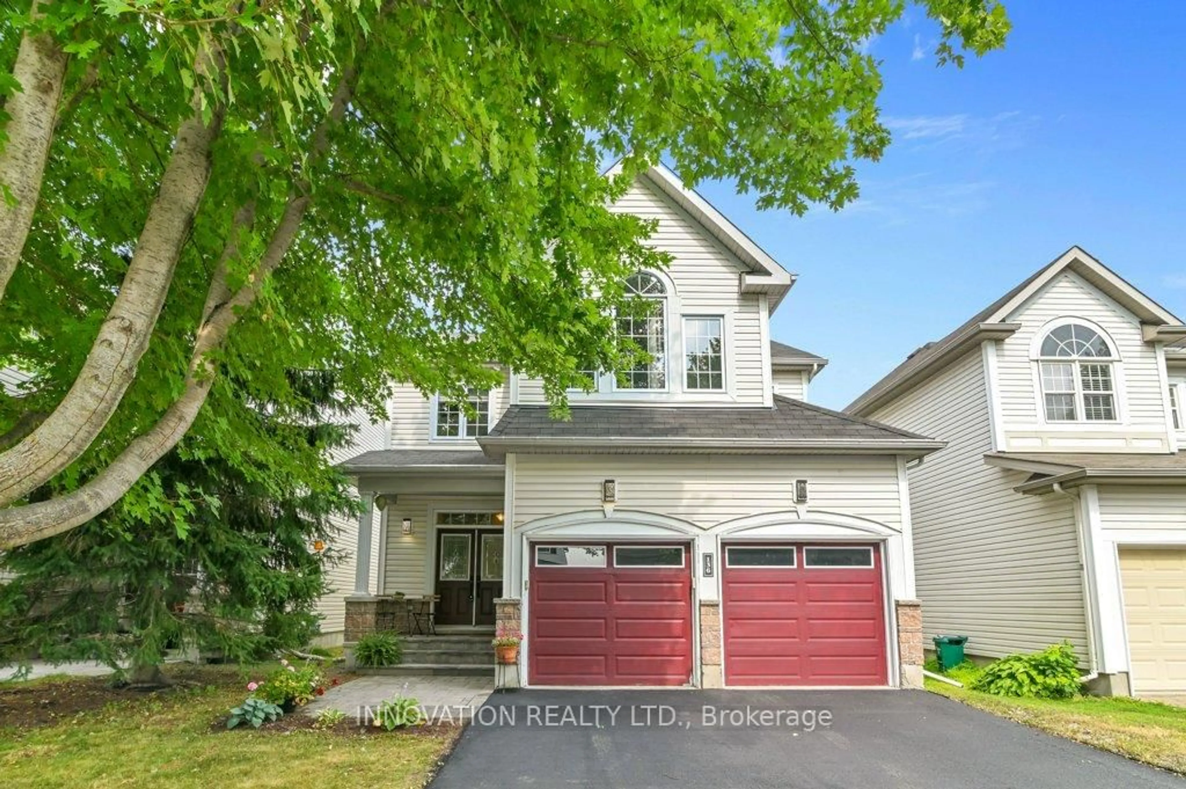 Home with vinyl exterior material, street for 136 Lamplighters Dr, Ottawa Ontario K2J 0C1