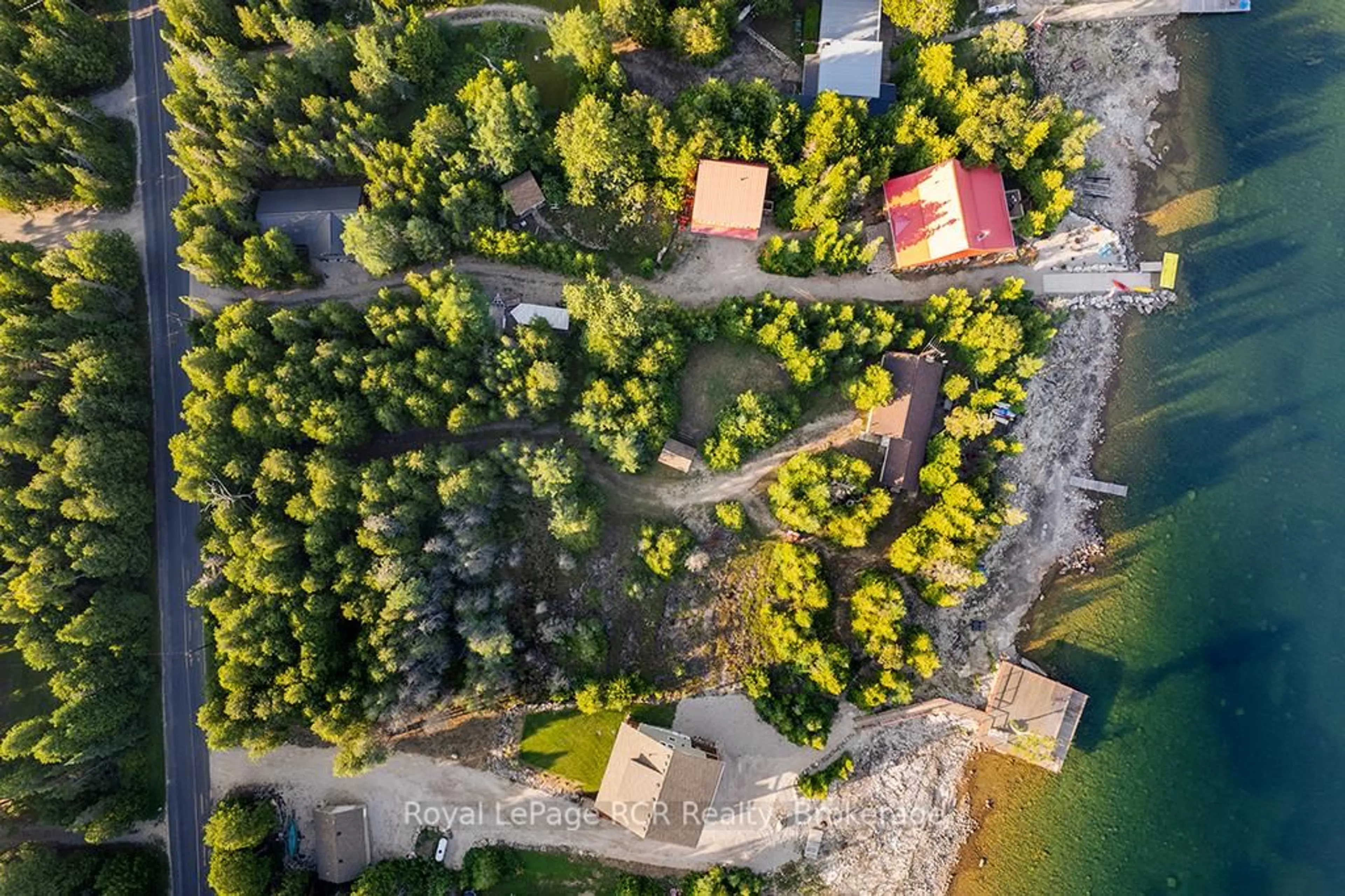 A pic from outside/outdoor area/front of a property/back of a property/a pic from drone, forest/trees view for 403 Eagle Rd, Northern Bruce Peninsula Ontario N0H 2R0