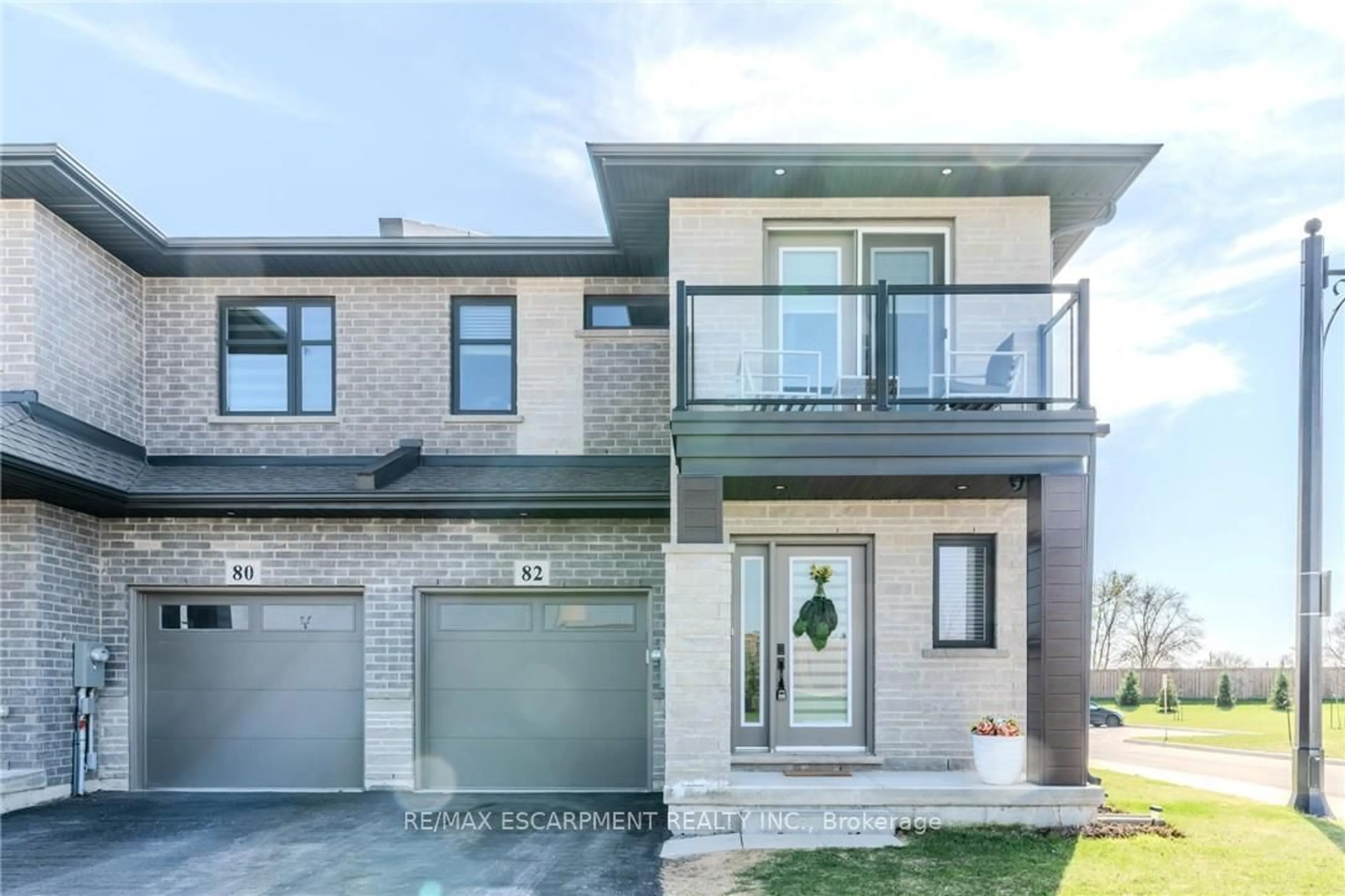 Home with brick exterior material, street for 82 JAYLA Lane, West Lincoln Ontario L0R 2A0