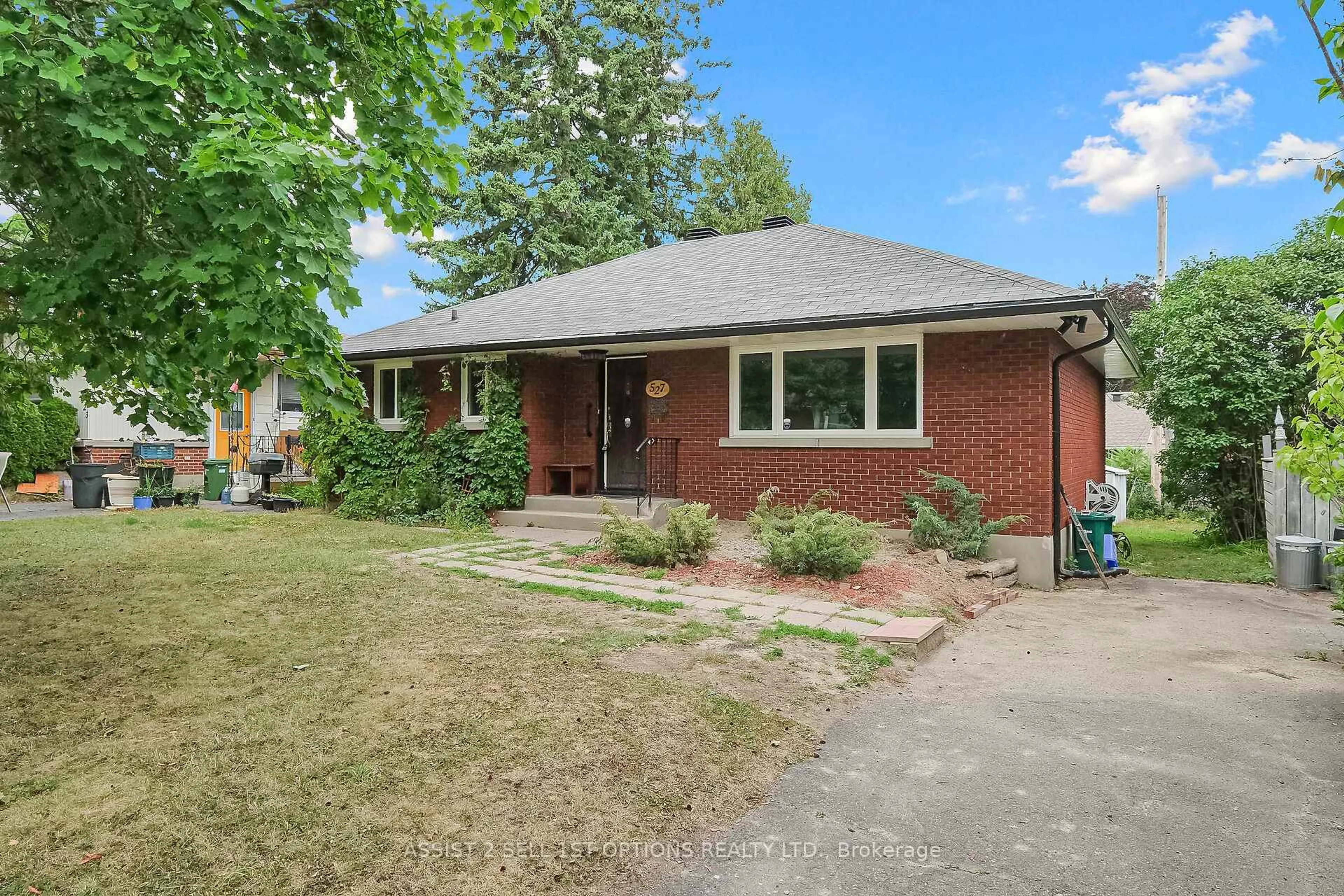 Home with brick exterior material, street for 527 Penhill Ave, Ottawa Ontario K1G 0V5