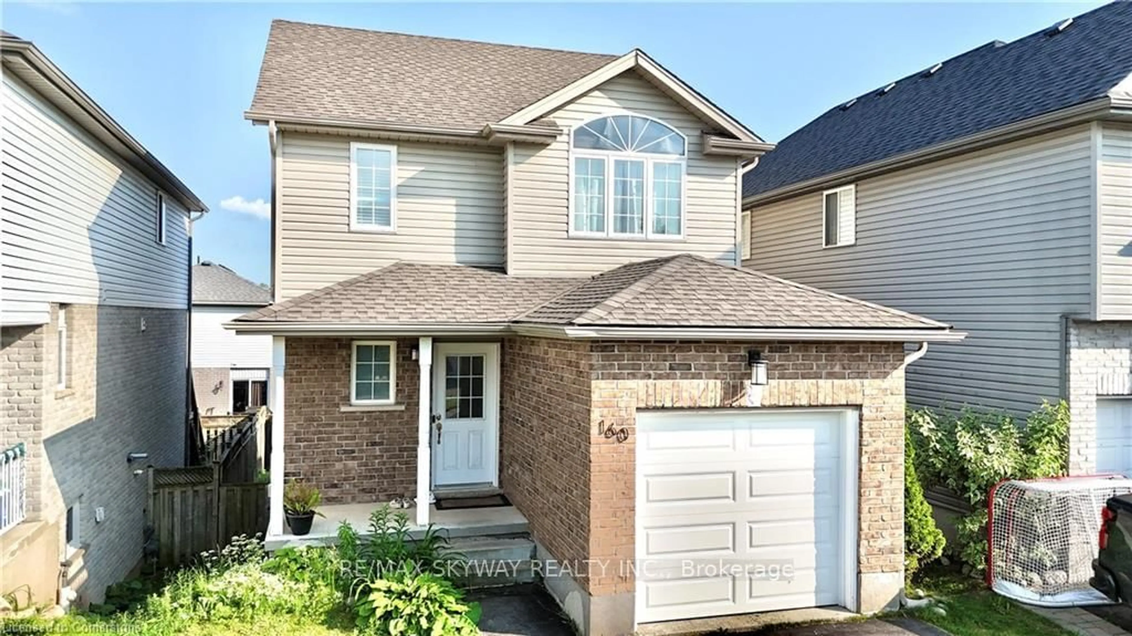 Home with vinyl exterior material, street for 160 Prosperity Dr, Kitchener Ontario N2E 4E5