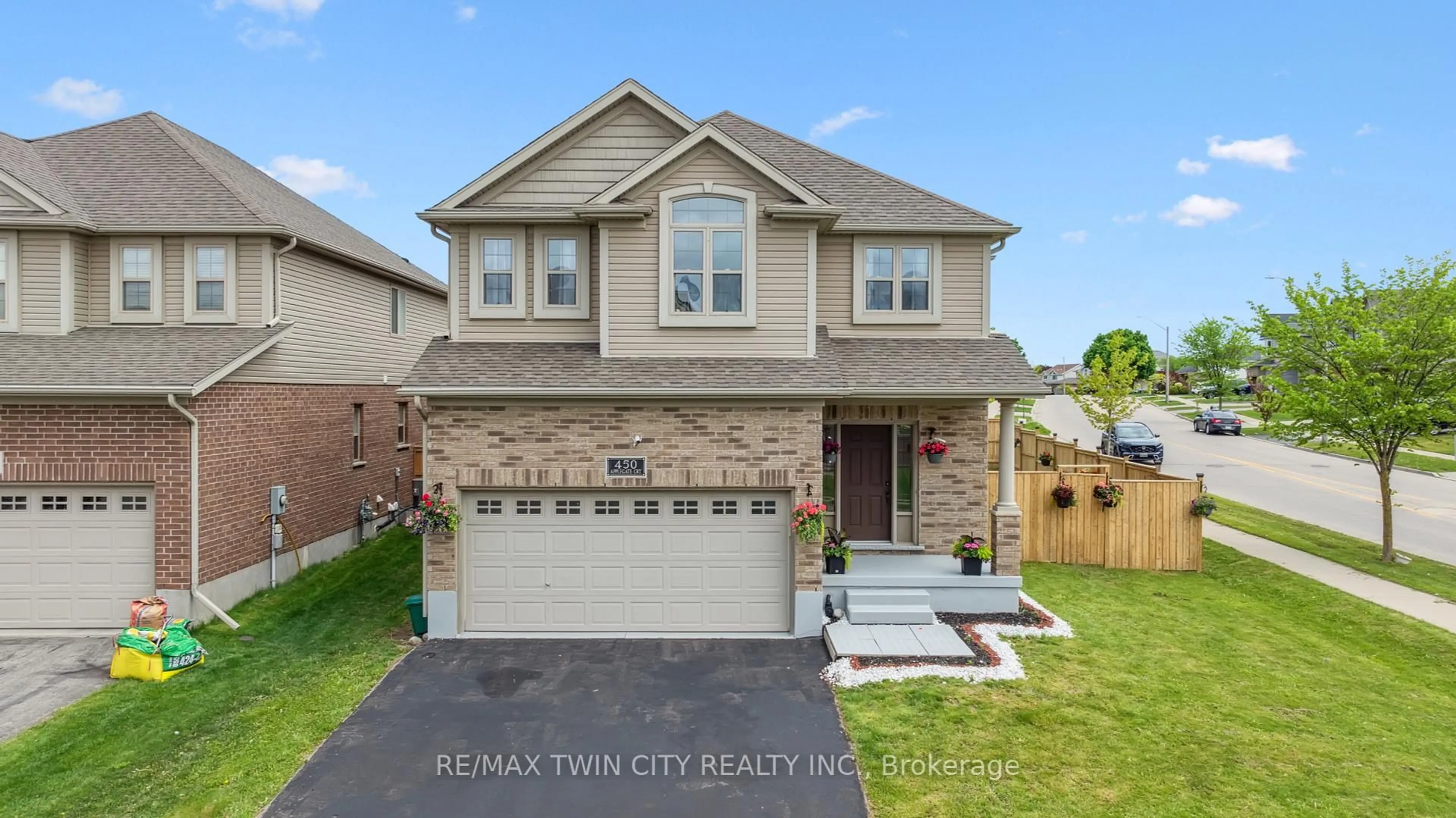 Home with brick exterior material, street for 450 Applegate Crt, Waterloo Ontario N2T 0A9