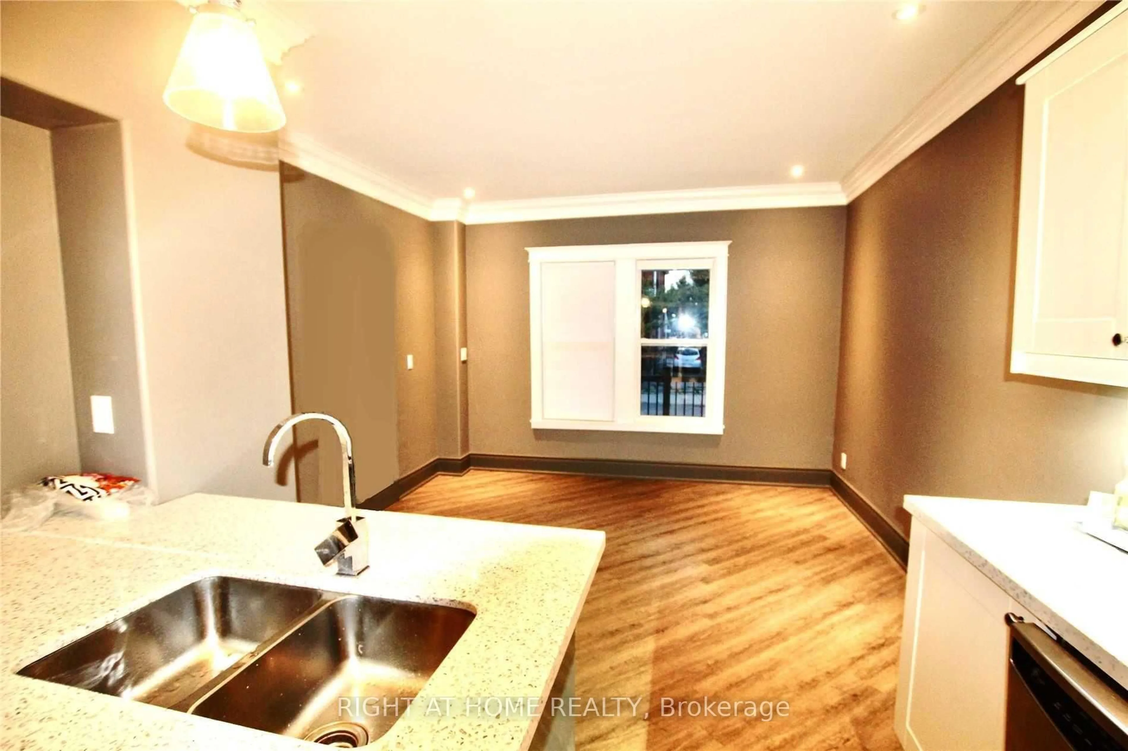 Open concept kitchen, wood/laminate floor for 50 Somerset Ave, Hamilton Ontario L8L 2L5
