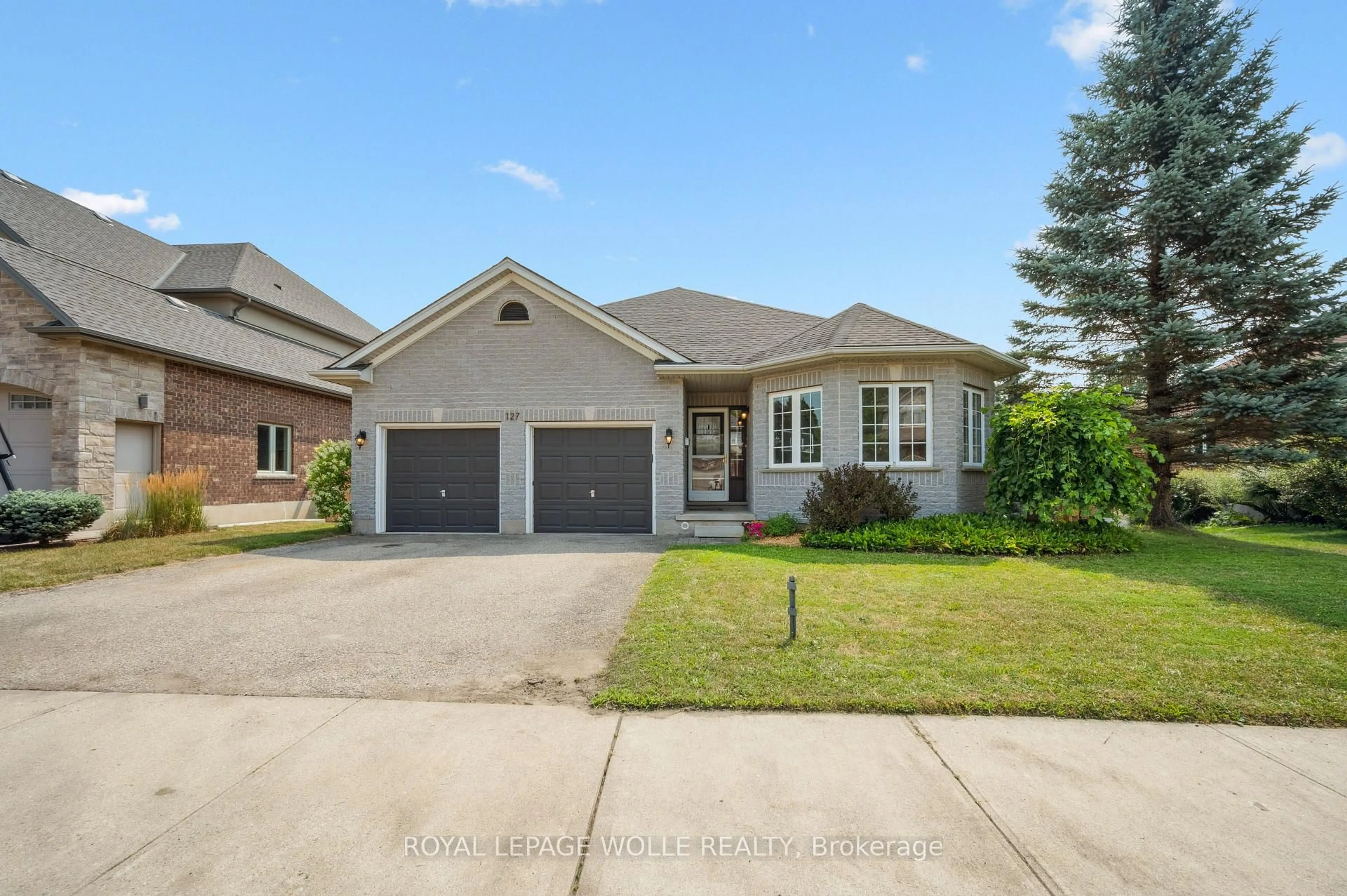 Home with brick exterior material, street for 127 Chandos Dr, Kitchener Ontario N2A 3Z5
