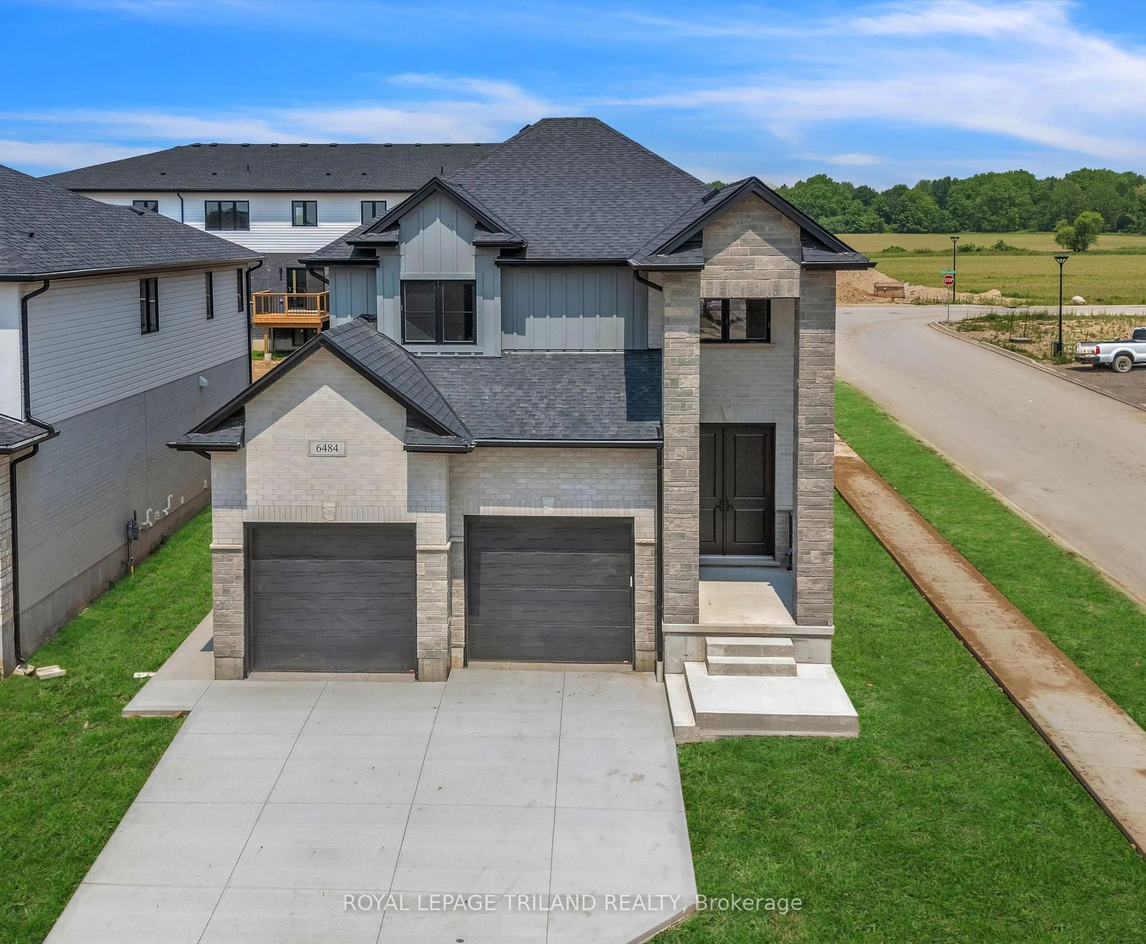 A pic from outside/outdoor area/front of a property/back of a property/a pic from drone, street for 6484 Heathwoods Ave, London South Ontario N6P 0J7