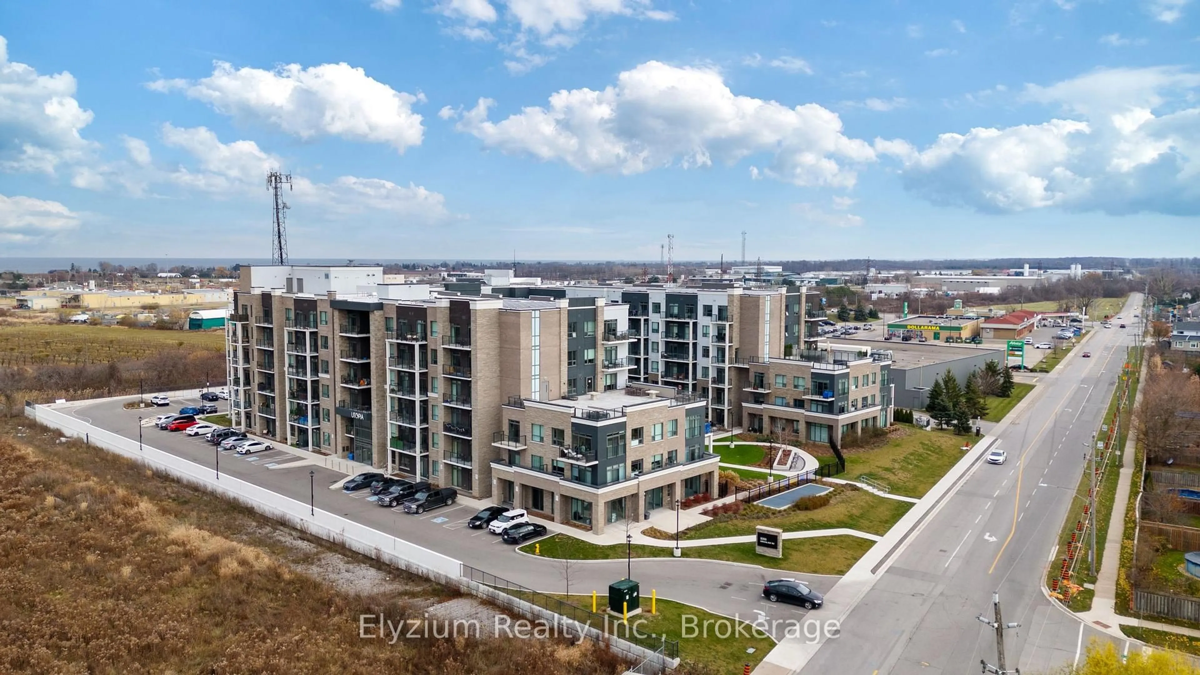 A pic from outside/outdoor area/front of a property/back of a property/a pic from drone, city buildings view from balcony for 5055 Greenlane Rd #127, Lincoln Ontario L3J 2J3