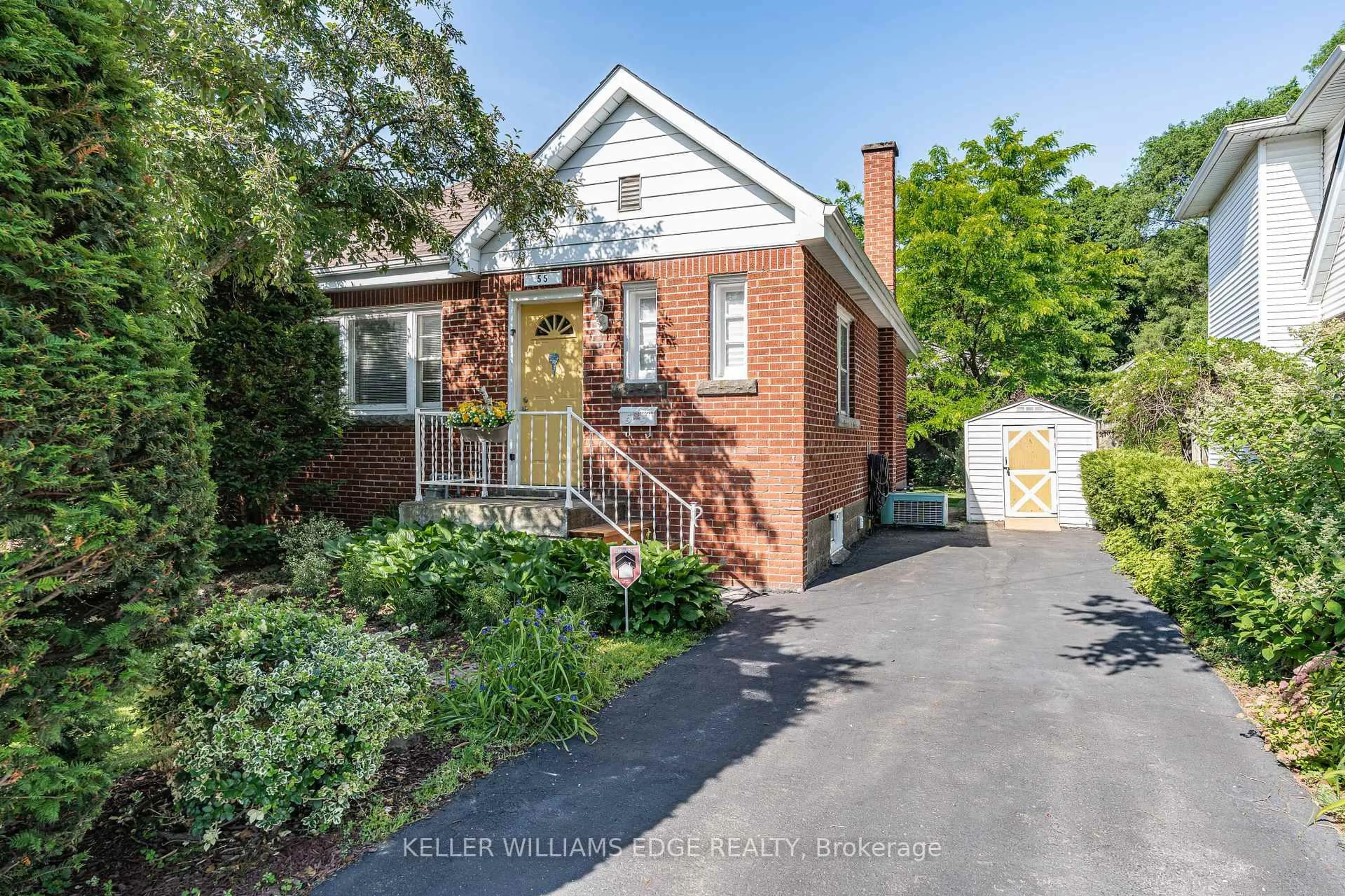 Home with brick exterior material, street for 55 East St, Hamilton Ontario L9H 1P2