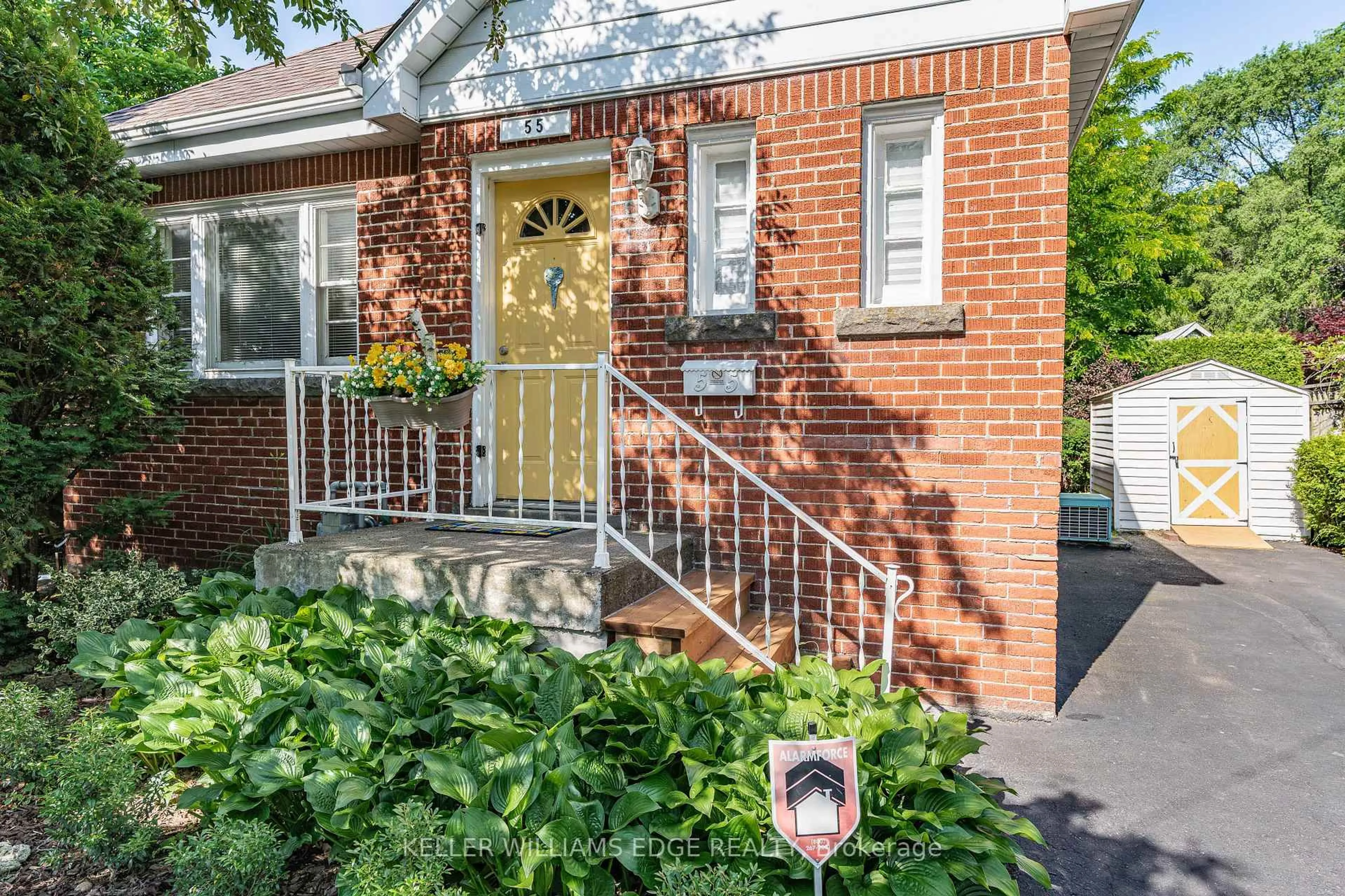 Home with brick exterior material, street for 55 East St, Hamilton Ontario L9H 1P2